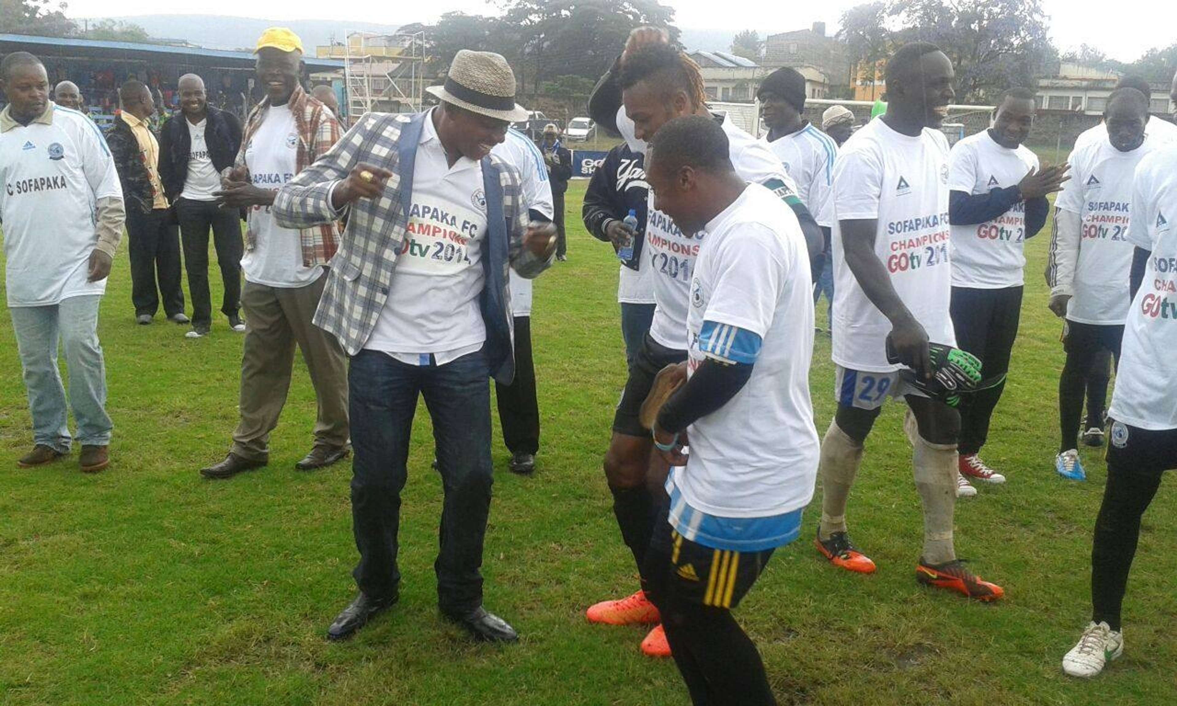 Sofapaka President Elly Kalekwa joins players to celebrate GOtv Shield trophy