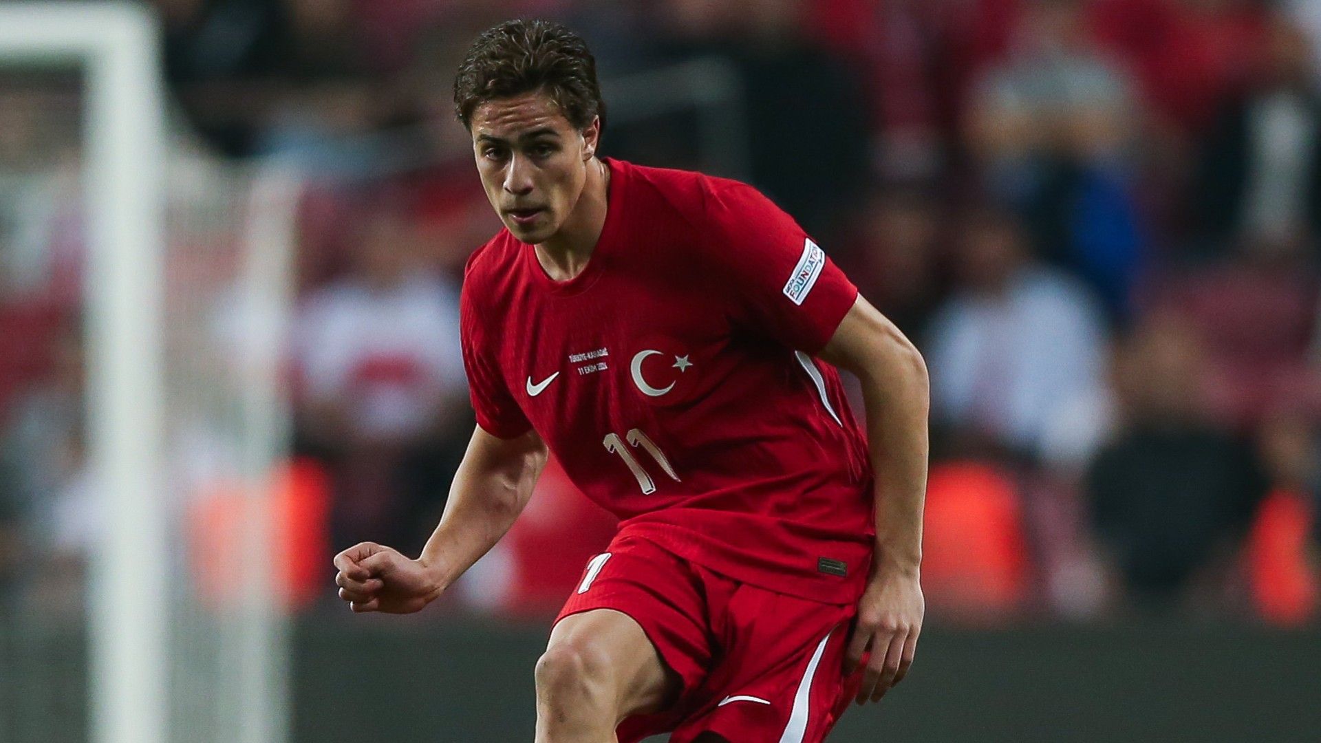 Kenan Yildiz of Turkey controls the ball 