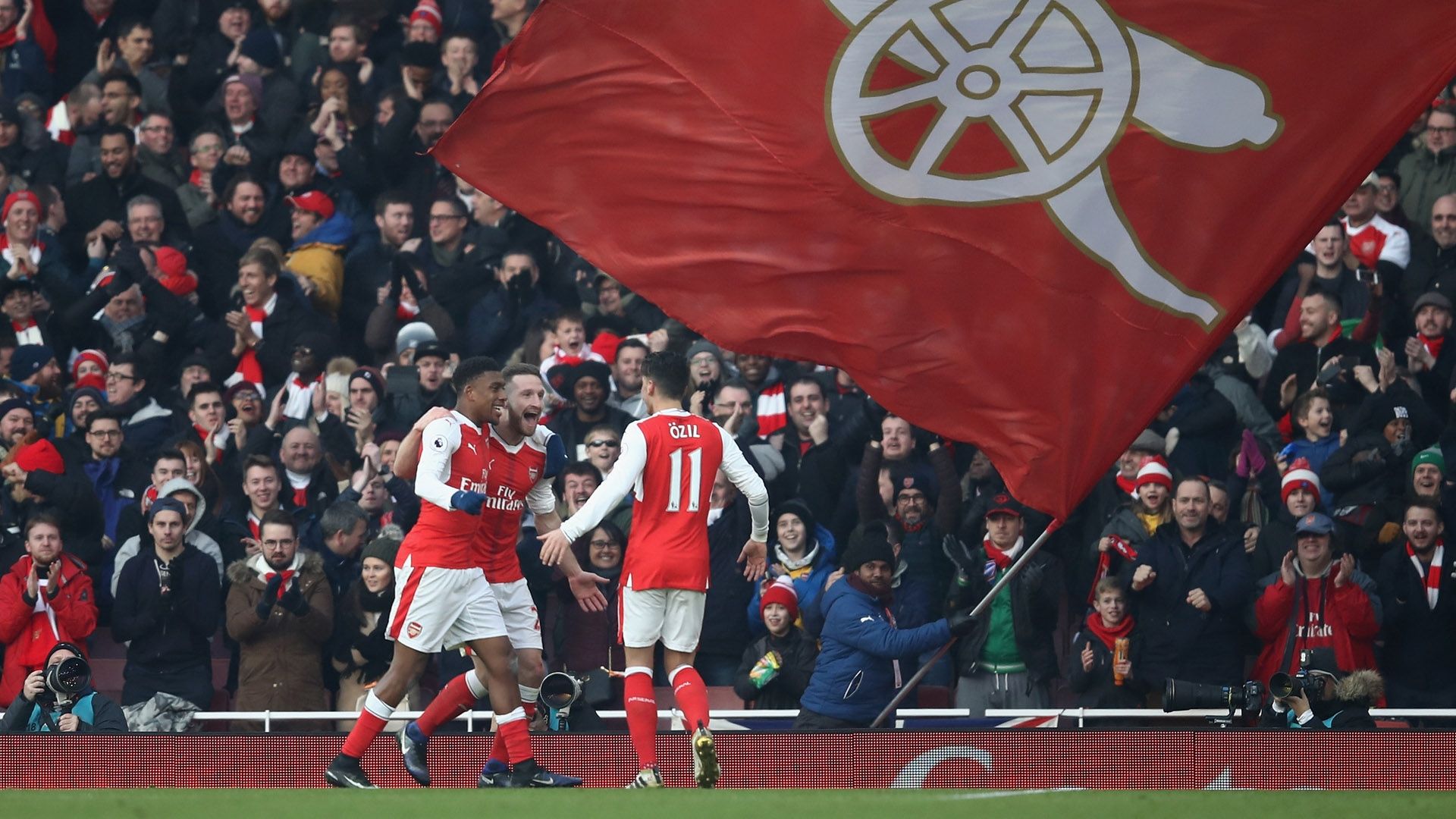 Shkodran Mustafi Alex Iwobi Mesut Ozil Arsenal Premier League