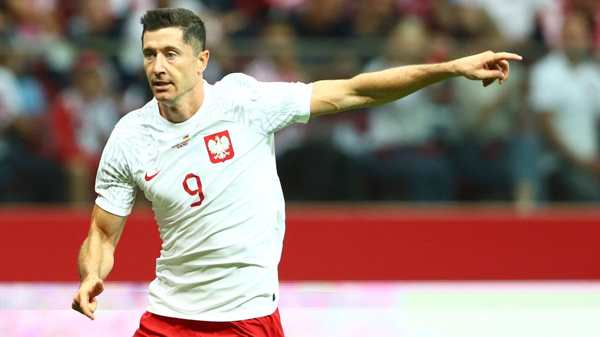 Poland's forward Robert Lewandowski gestures