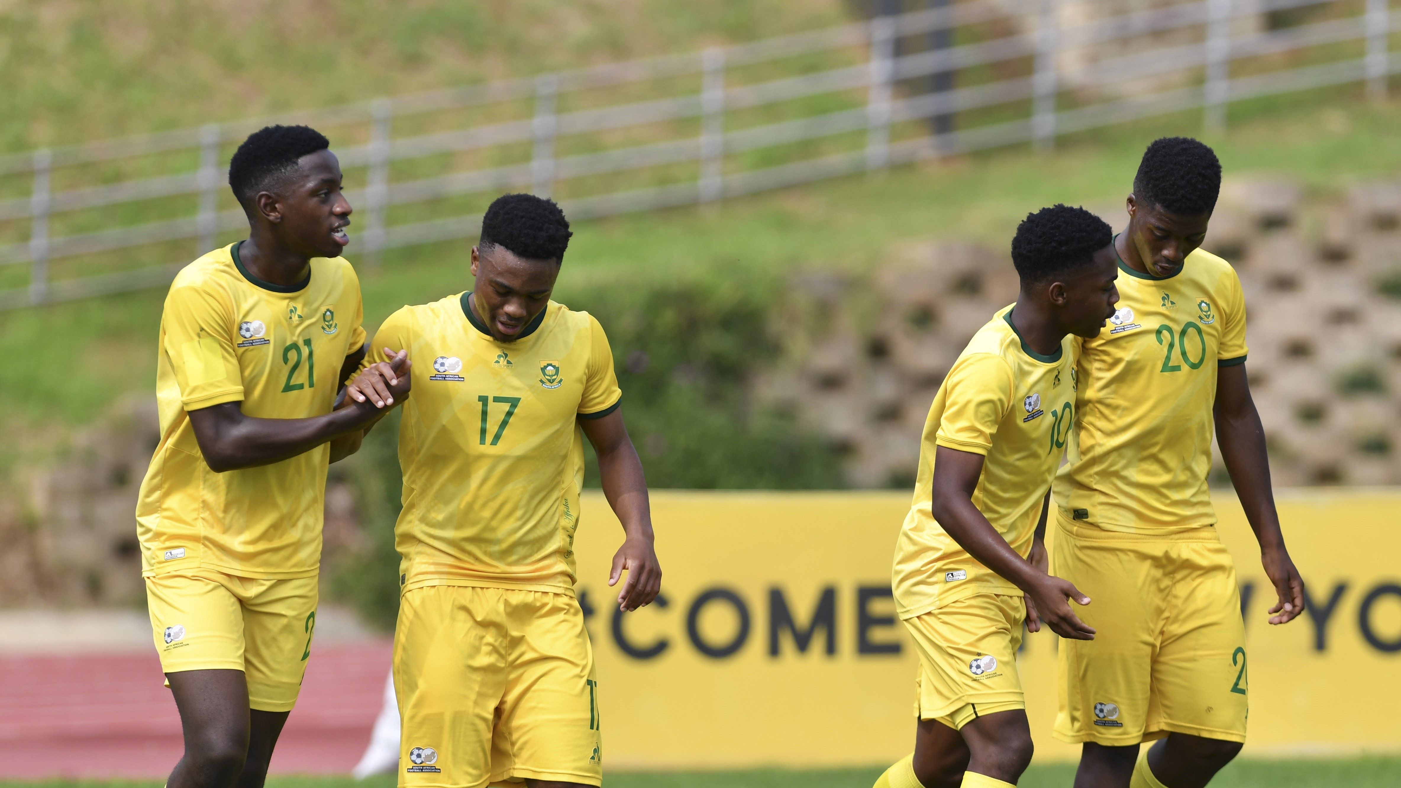 Langelihle Phili celebrates a goal with Amajita teammates