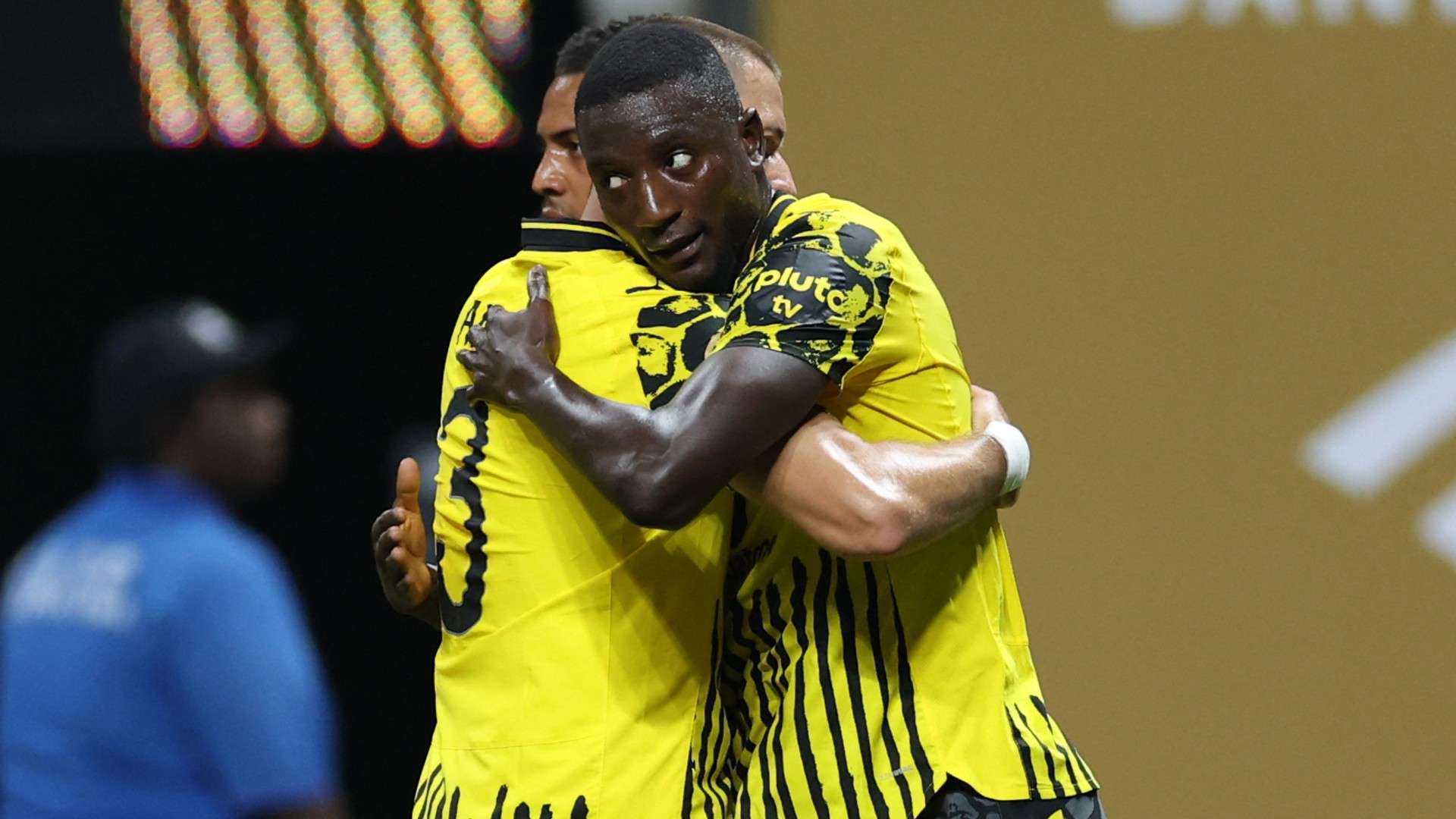 Borussia Dortmund's Guinean forward #09 Serhou Guirassy (R) celebrates scoring his team's second goal