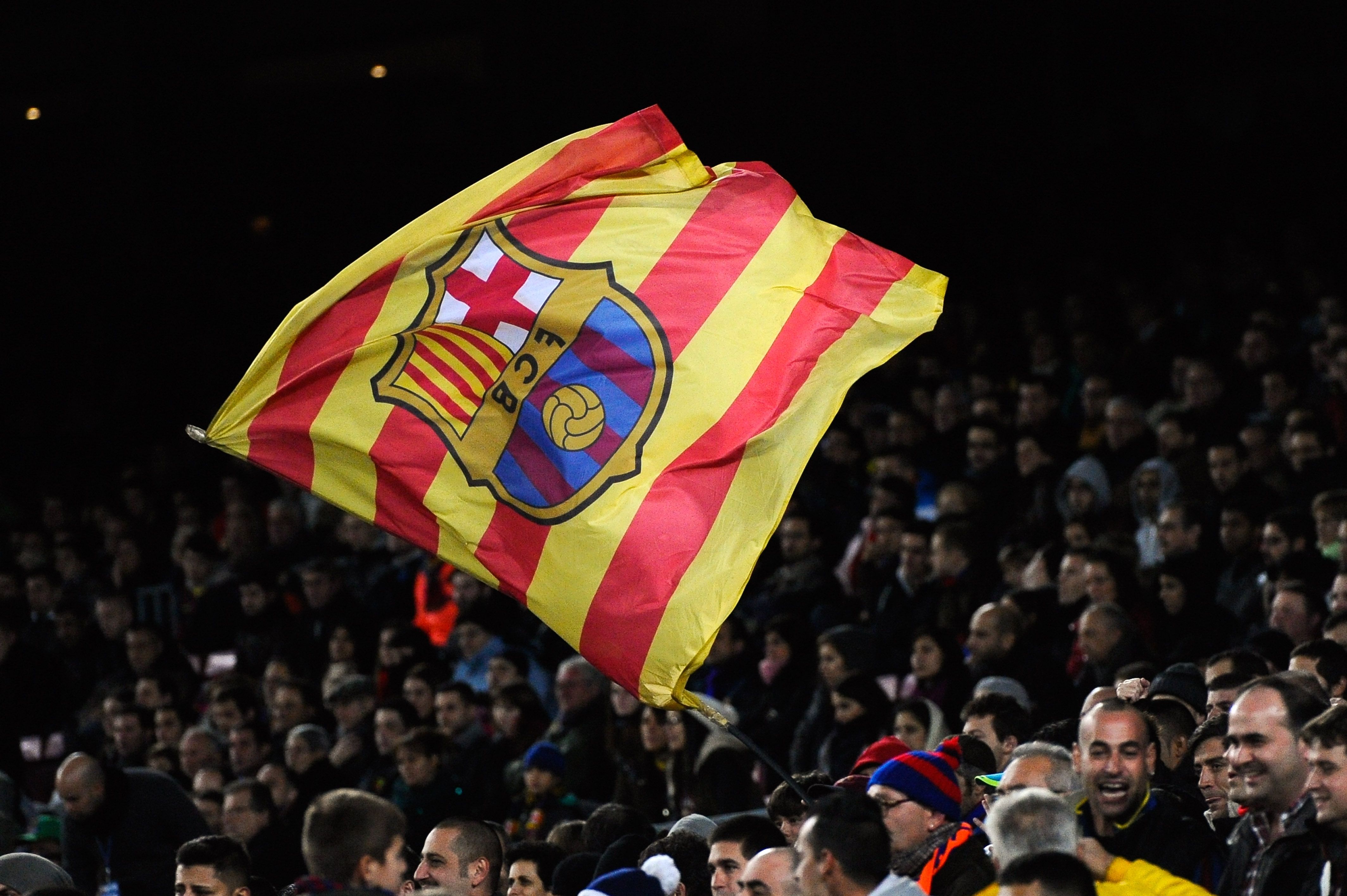 Barcelona supporter waves a Catalan flag