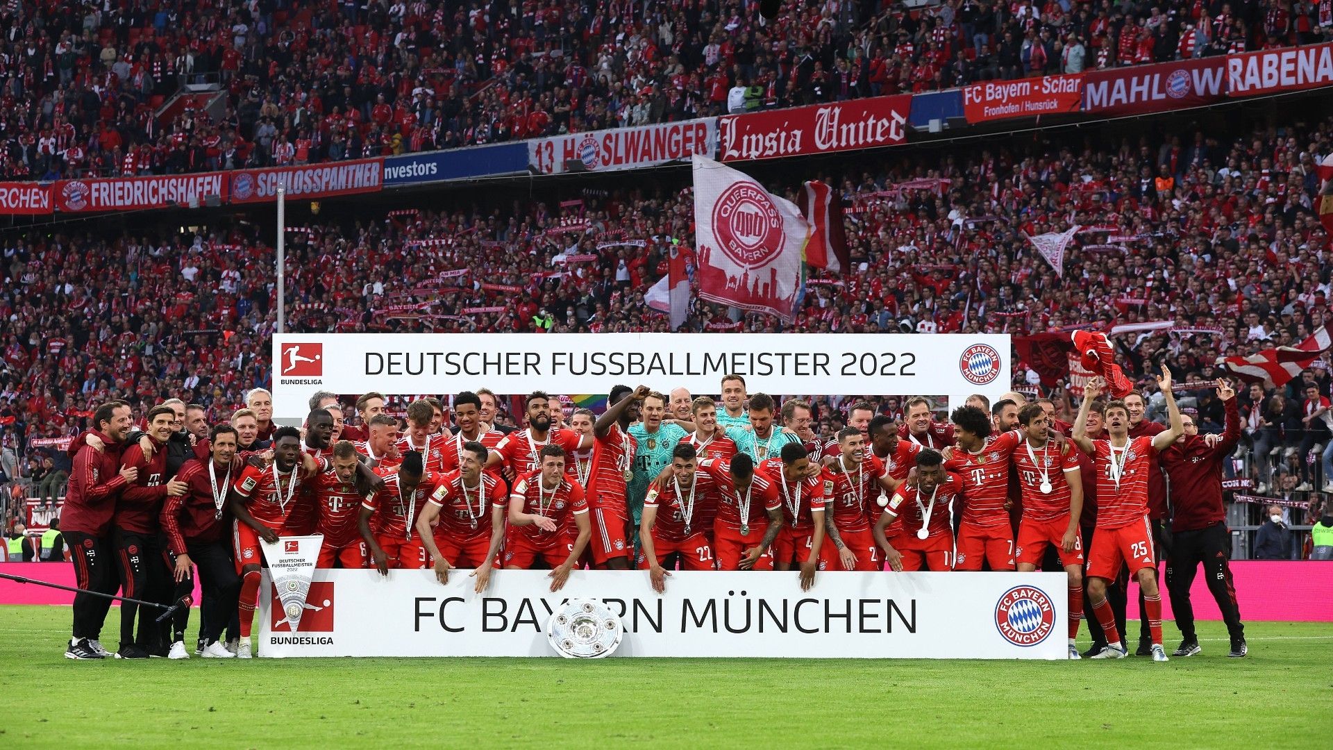 FC Bayern Muenchen players celebrate with The Bundesliga Meisterschale trophy