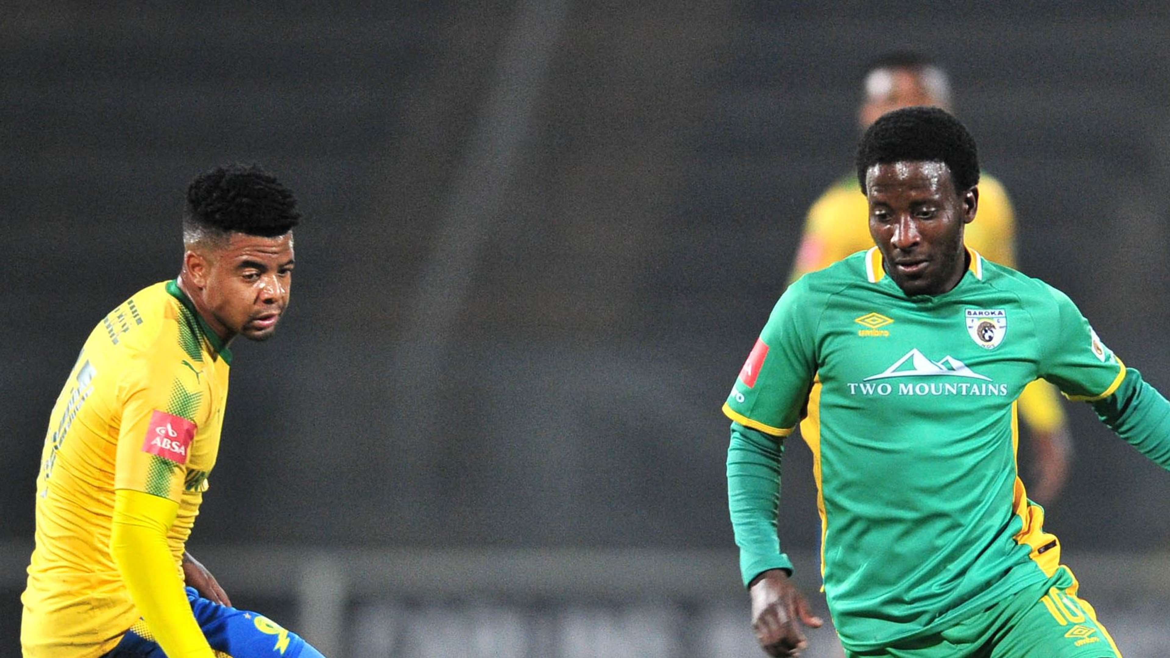 Siphelele Ntshangase of Baroka FC challenged by George Lebese of Mamelodi Sundowns