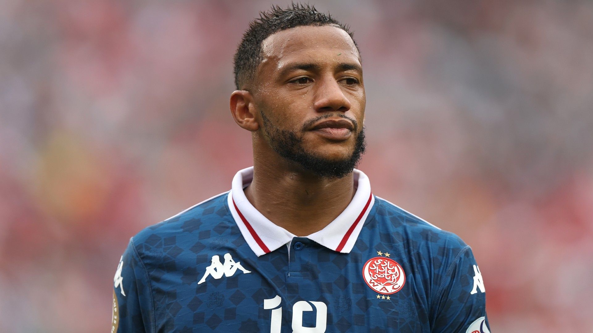  Fahd Moufi #18 of Wydad AC looks on