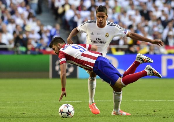 RAPHAEL VARANE DAVID VILLA REAL MADRID ATLETICO MADRID CHAMPIONS LEAGUE 05242014