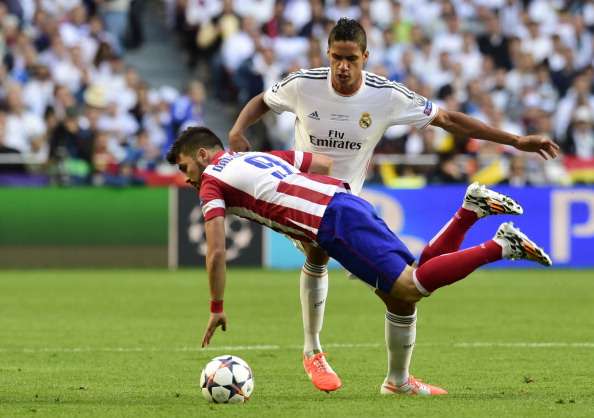 RAPHAEL VARANE DAVID VILLA REAL MADRID ATLETICO MADRID CHAMPIONS LEAGUE 05242014