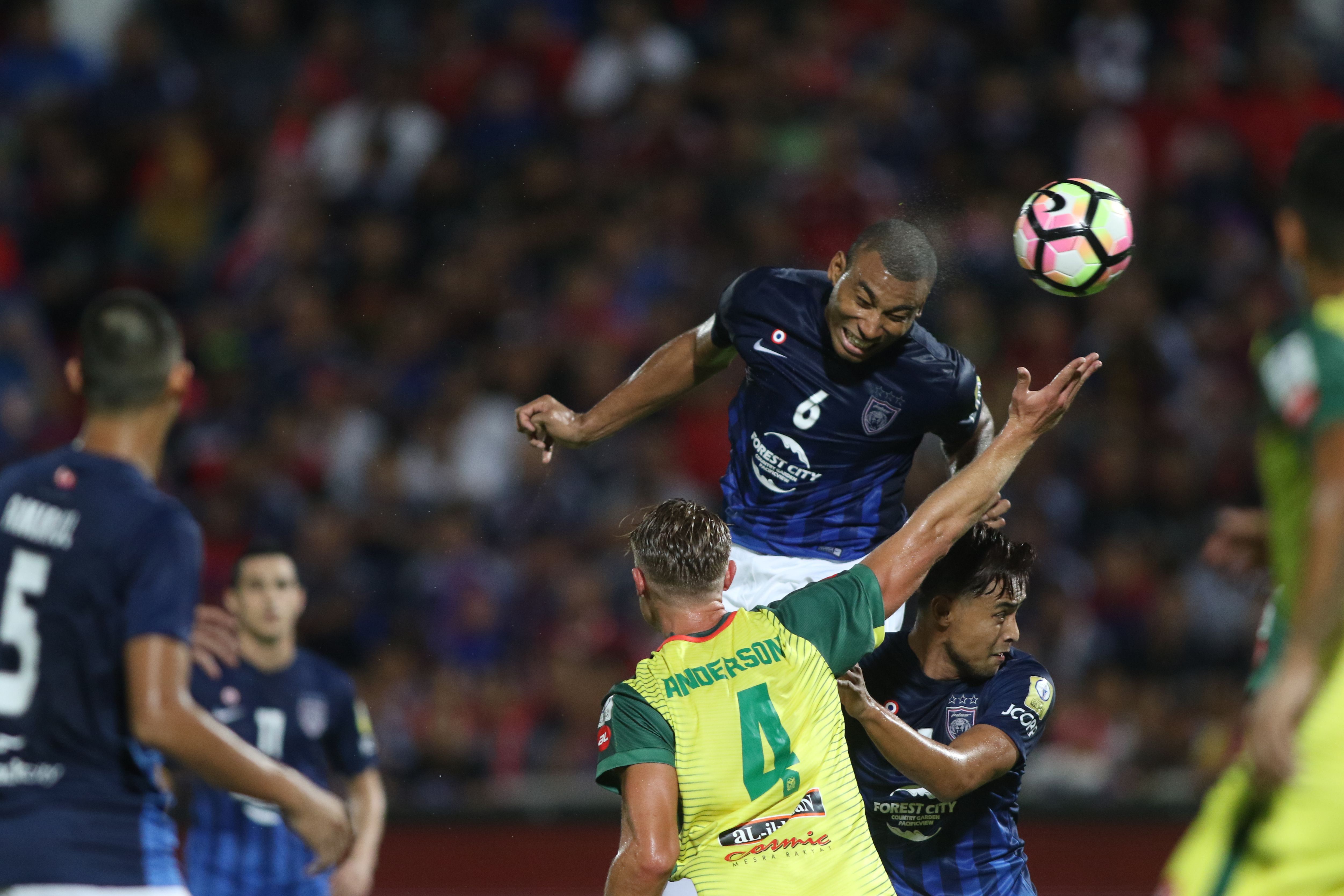 Johor Darul Ta'zim's Marcos Antonio heads the ball during their game against Kedah 20/1/2017