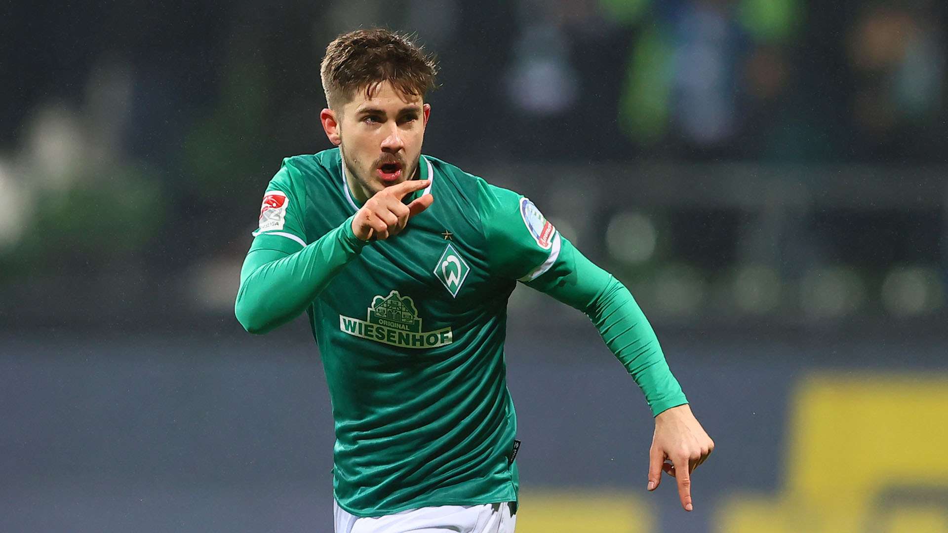 Romano Schmid of Bremen celebrates scoring his team's first goal