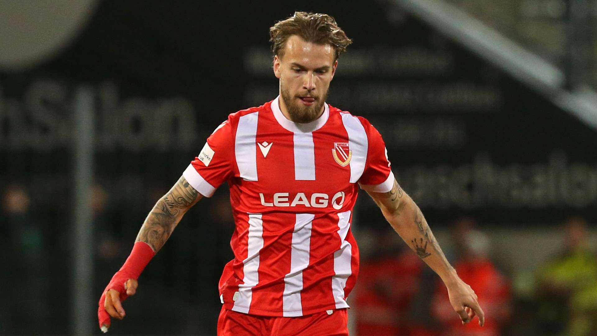 Niko Bretschneider of Cottbus runs with the ball