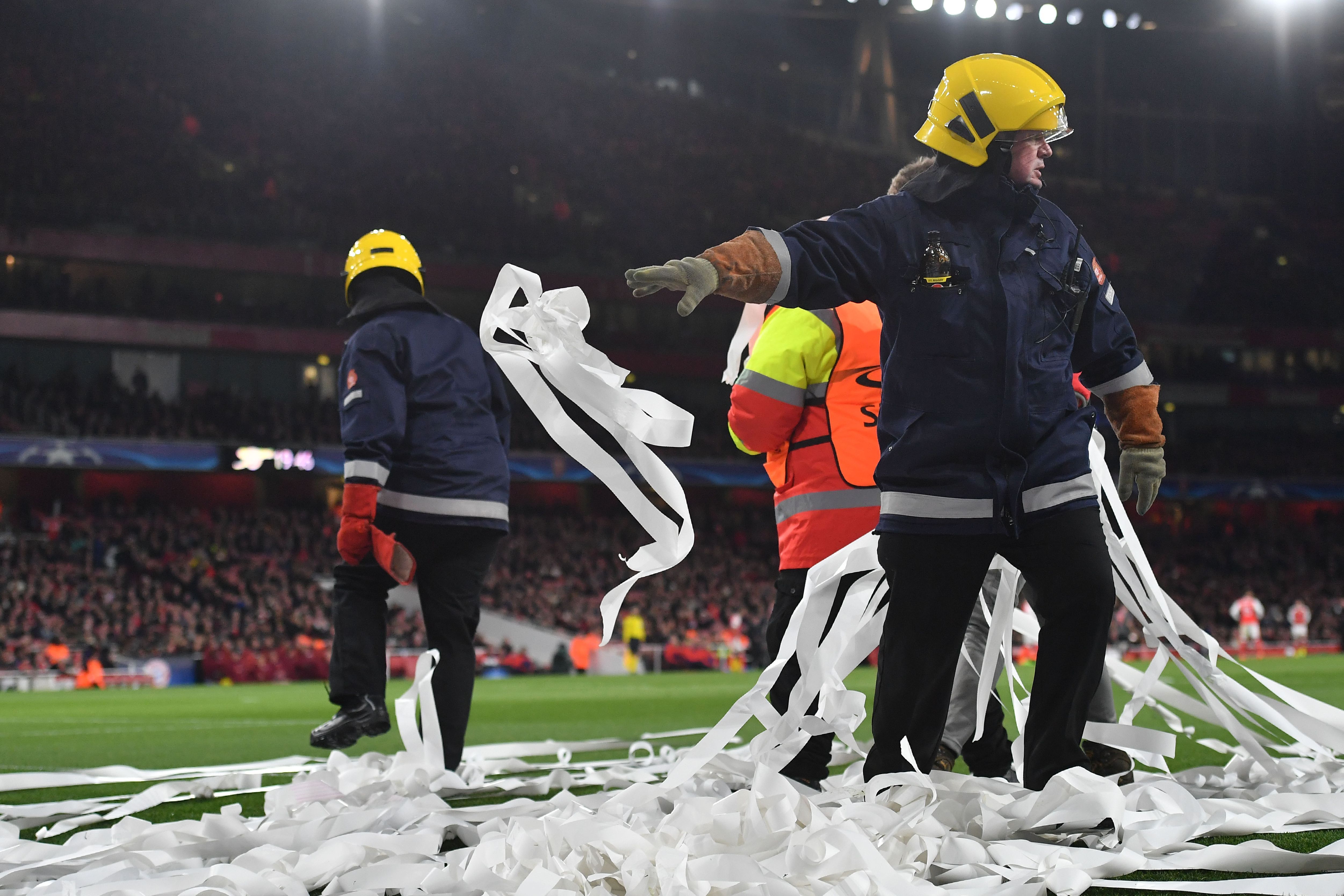 Bayern fans throw rolls of paper