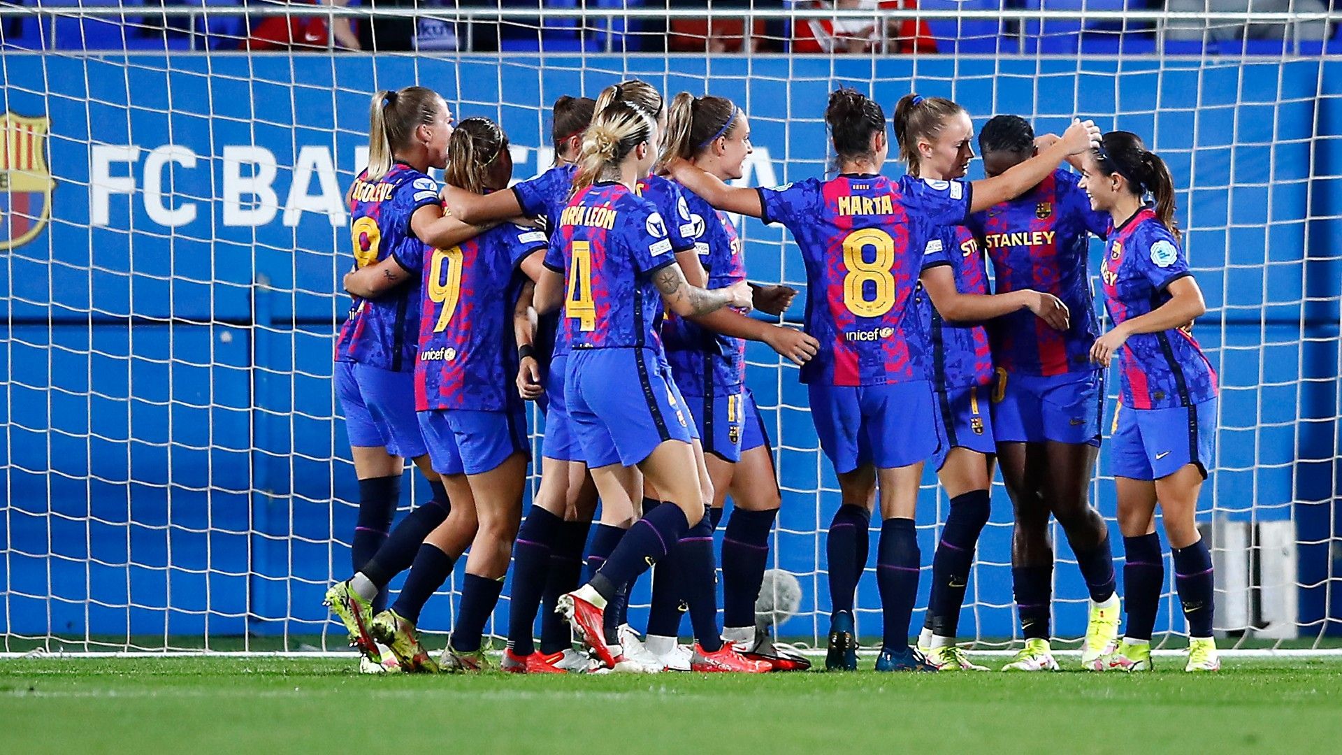 Asisat Oshoala celebrates with Barcelona teammates