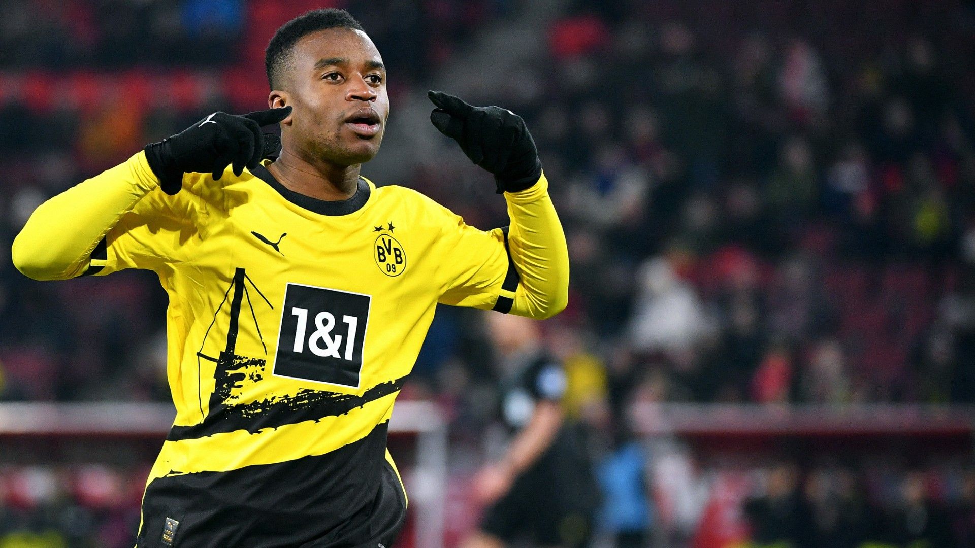 Dortmund's German forward #18 Youssoufa Moukoko celebrates his 0-4 