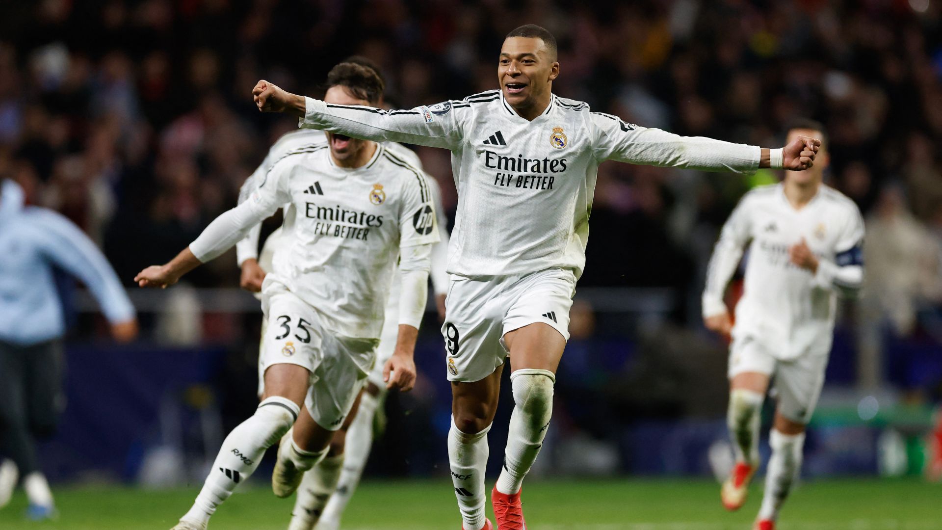 Real Madrid's French forward #09 Kylian Mbappe celebrates