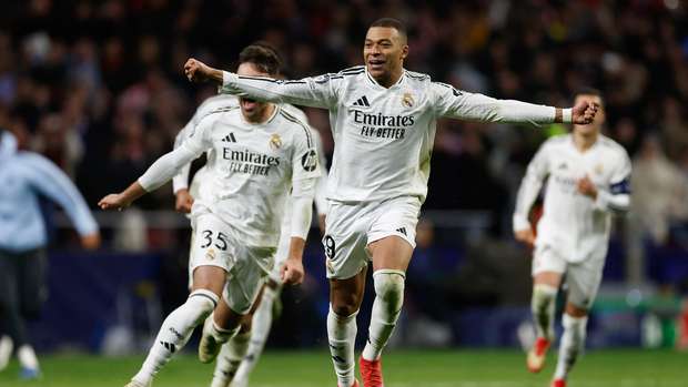 Real Madrid's French forward #09 Kylian Mbappe celebrates