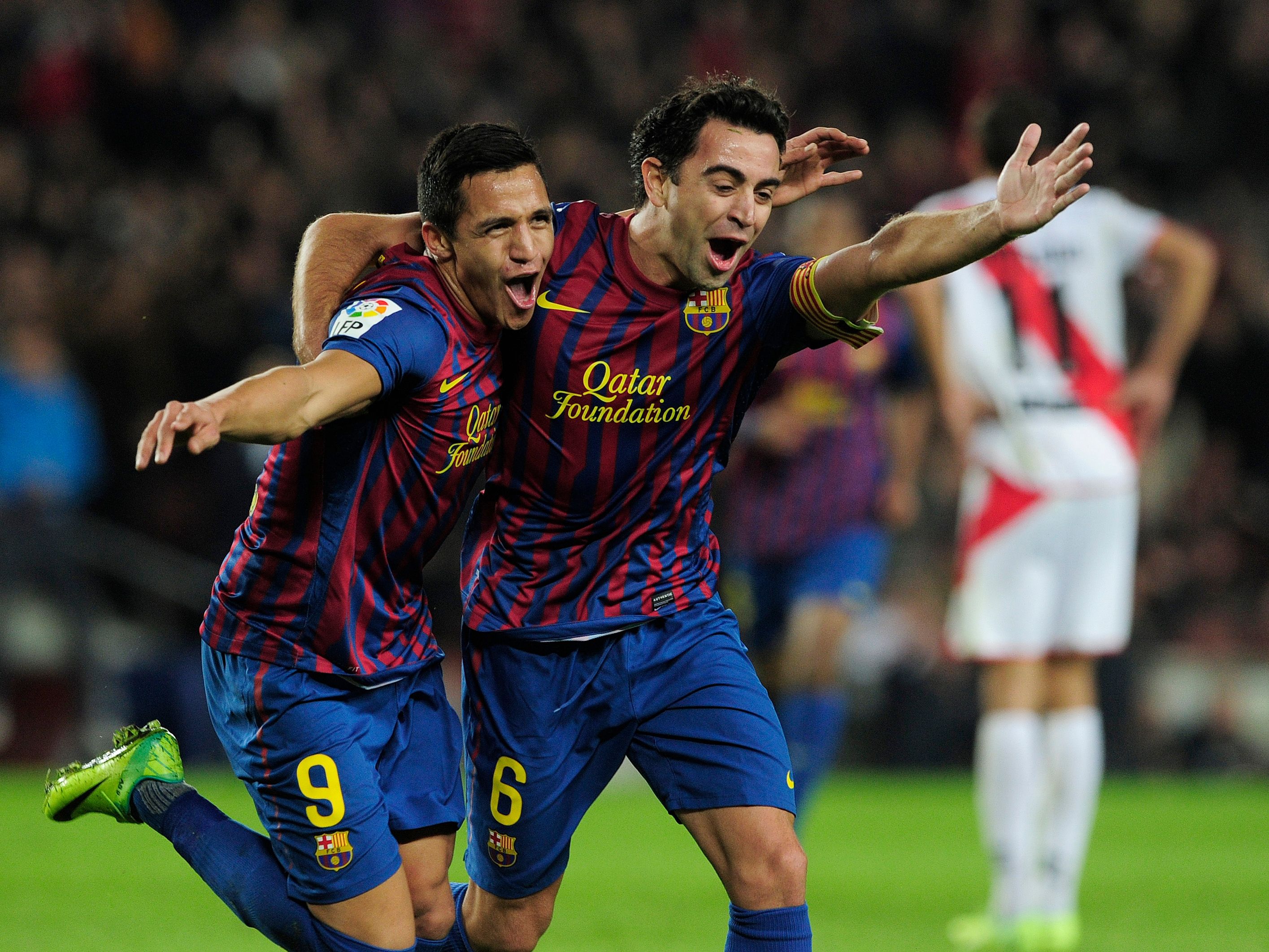 Alexis Sánchez y Xavi. Barcelona