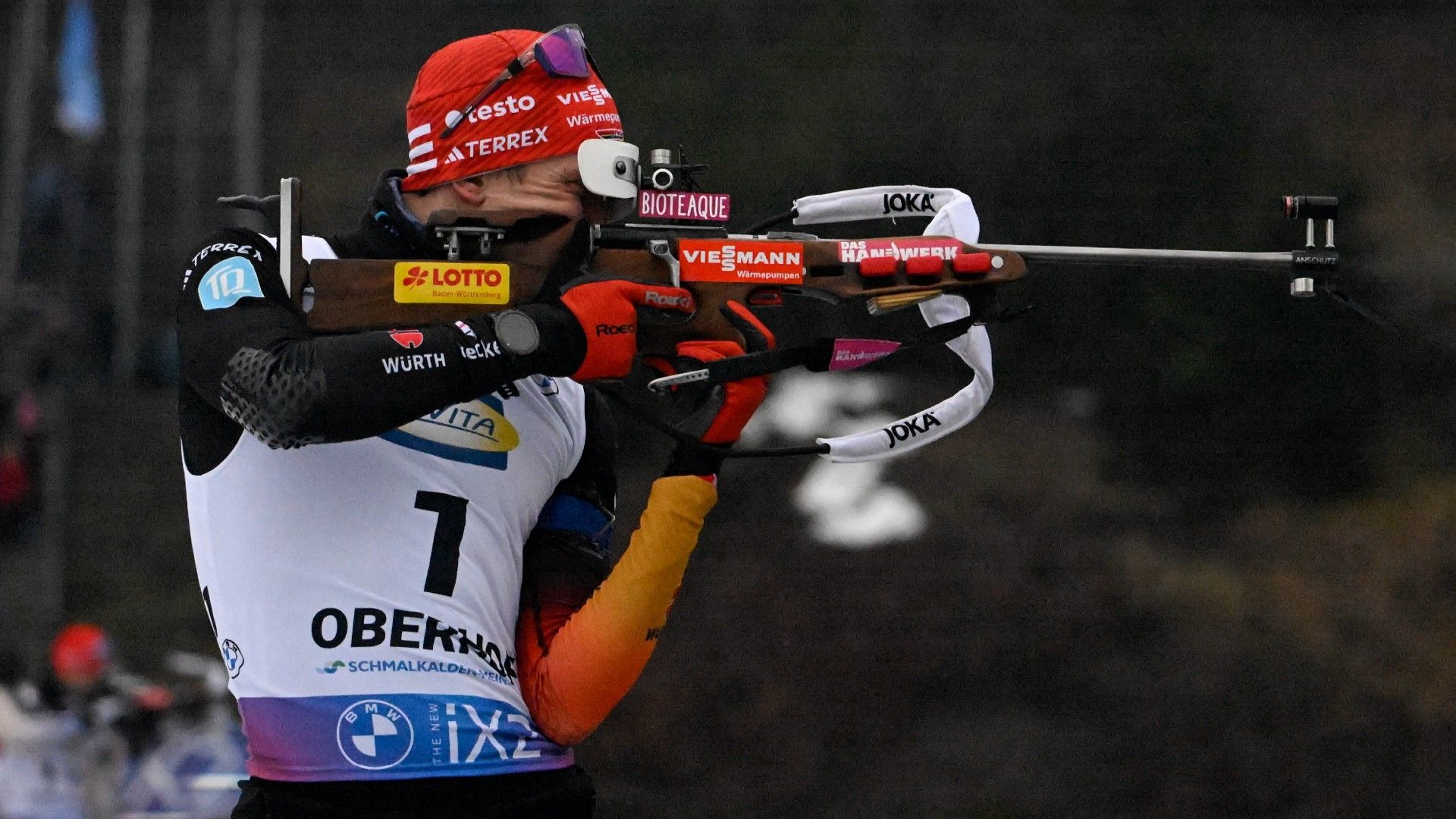 Germany's Benedikt Doll zeros his rifle