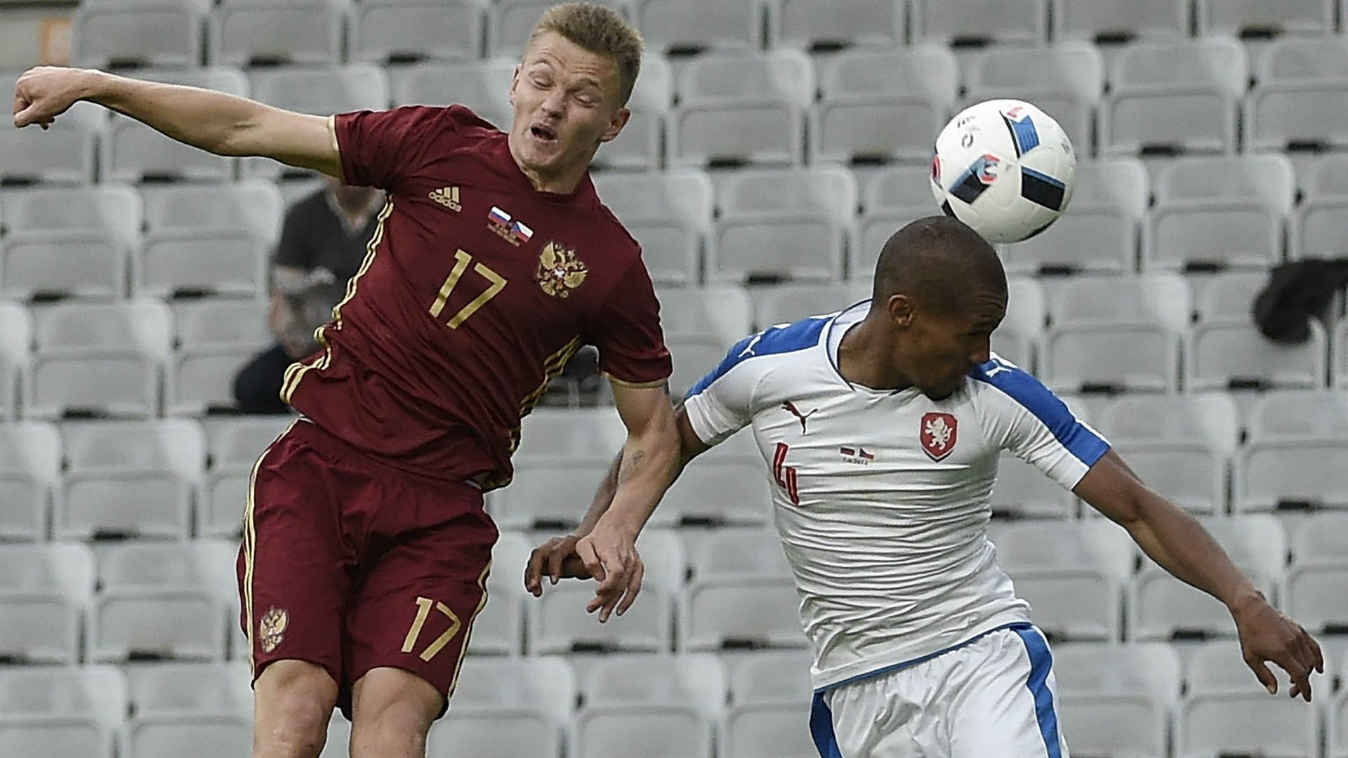Czech Republic's Theodor Gebre Selassie and Russia's Oleg Shatov vie for the ball during the international friendly football match