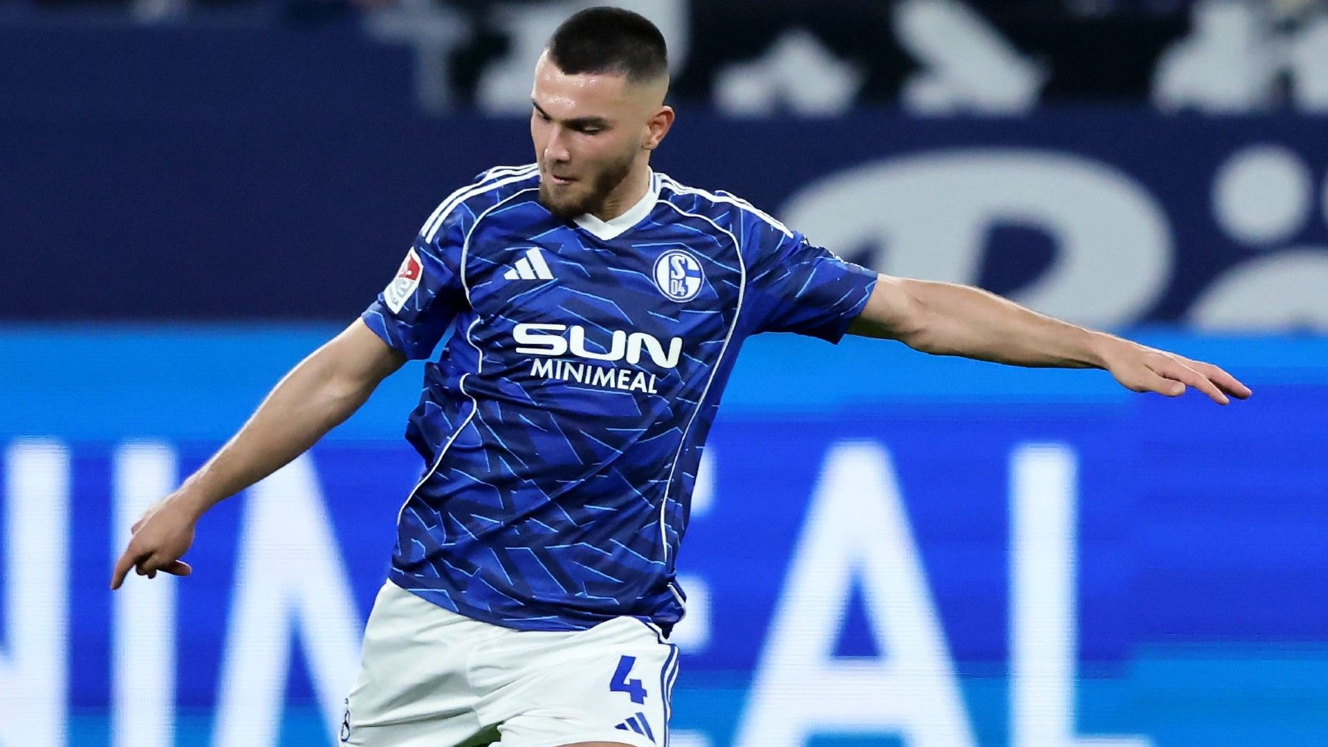 Hasan Kurucay of FC Schalke 04 runs with the ball 