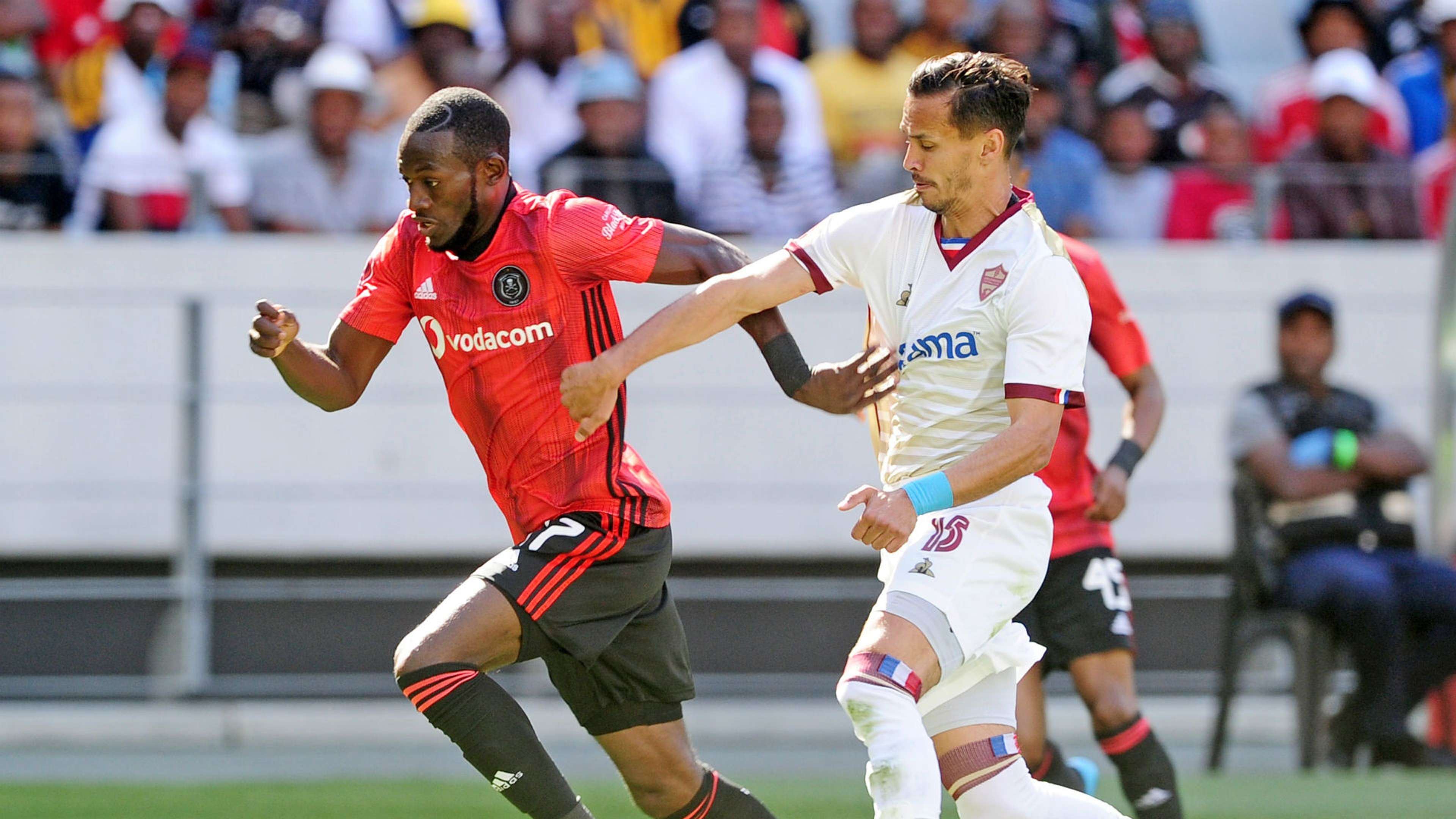 Augustine Mulenga of Orlando Pirates is challenged by Kristopher Bergman of Stellenbosch FC, October 2019