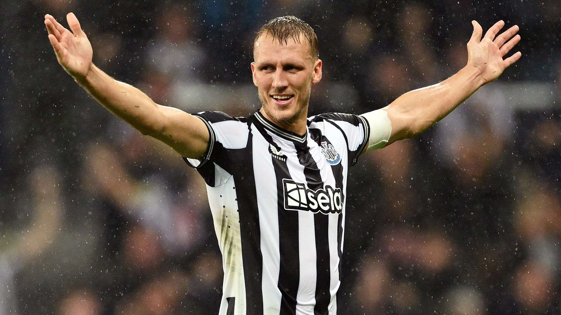 Dan Burn celebrates scoring for Newcastle