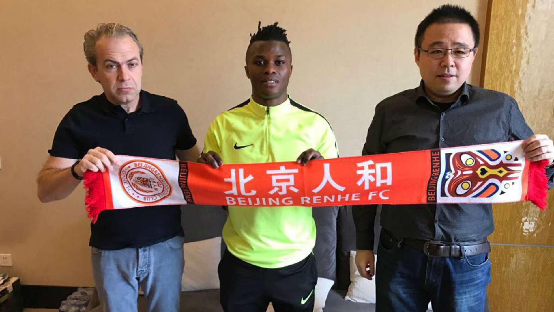 Ayub Timbe signs in China.