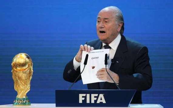 FIFA president Joseph Blatter opens the envelope to reveal that Qatar will host the 2022 World Cup