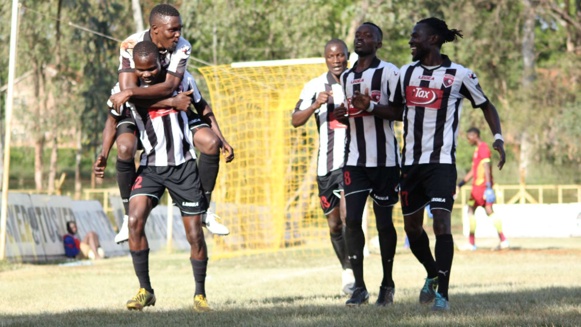 Jeremiah Wanjala leads his teammates of Ushuru FC.