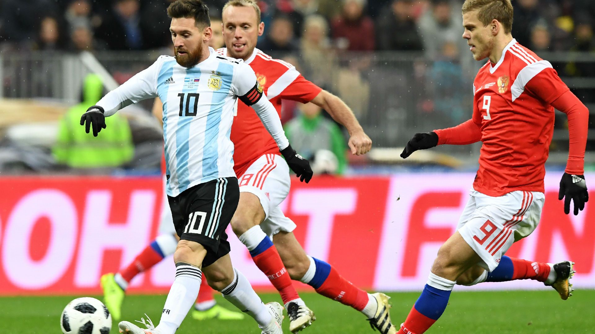 Lionel Messi and Aleksandr Kokorin.