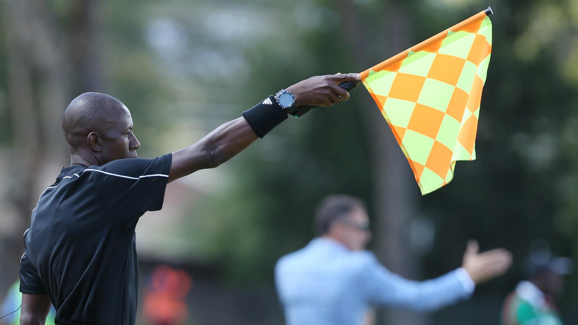 Kenyan referee at Machakos Stadium.
