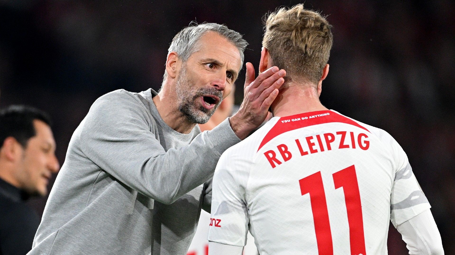 Marco Rose, Head Coach of RB Leipzig, gives instructions to Timo Werner
