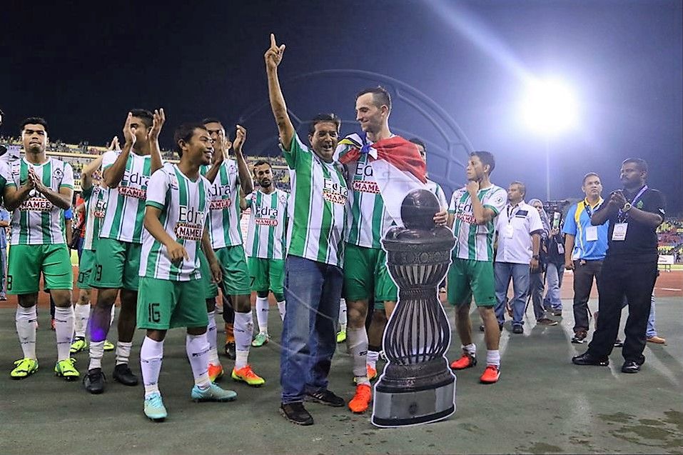 Melaka United players celebrating their Premier League title win 9/9/2016