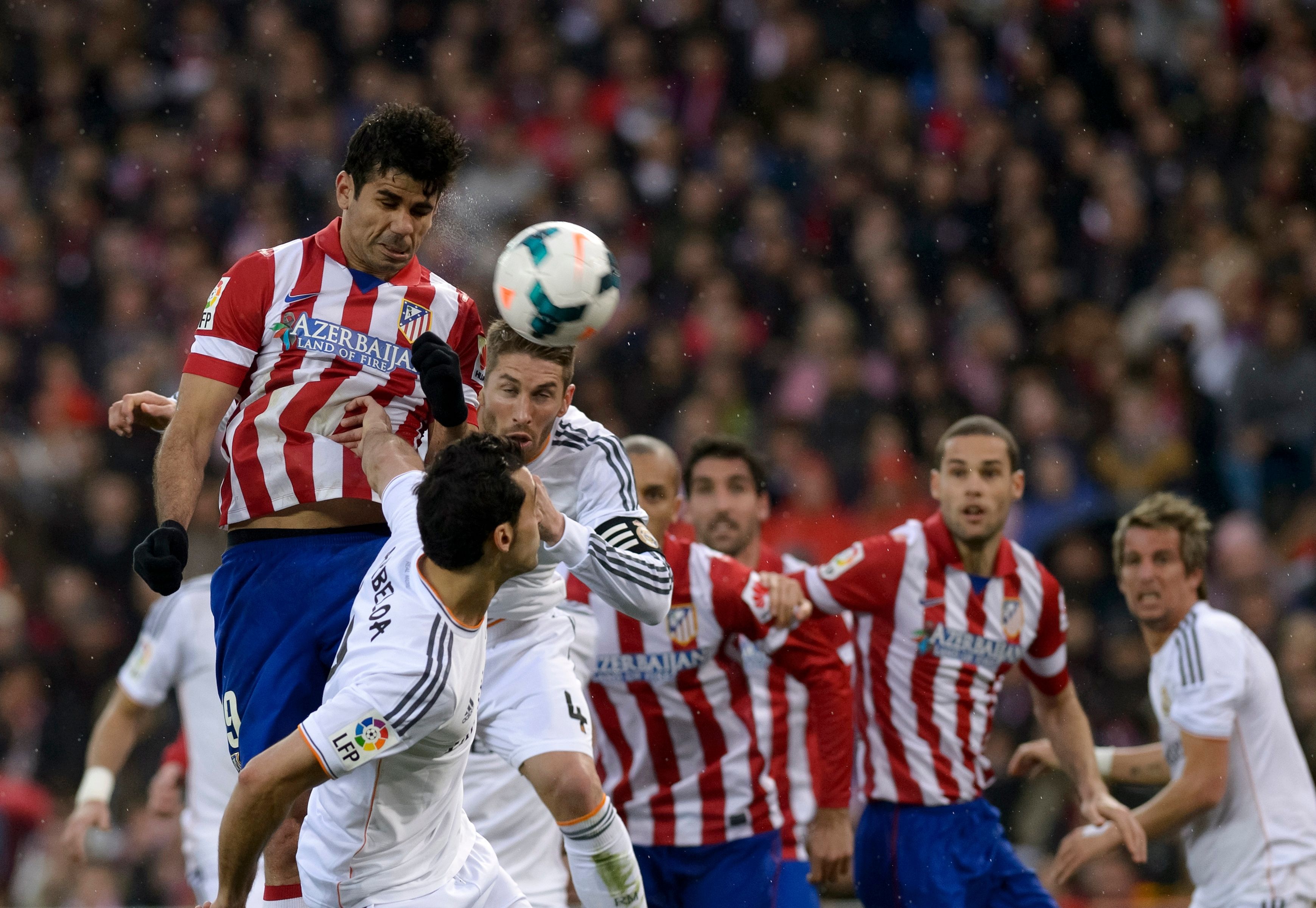 Sergio Ramos battles in the Madrid derby