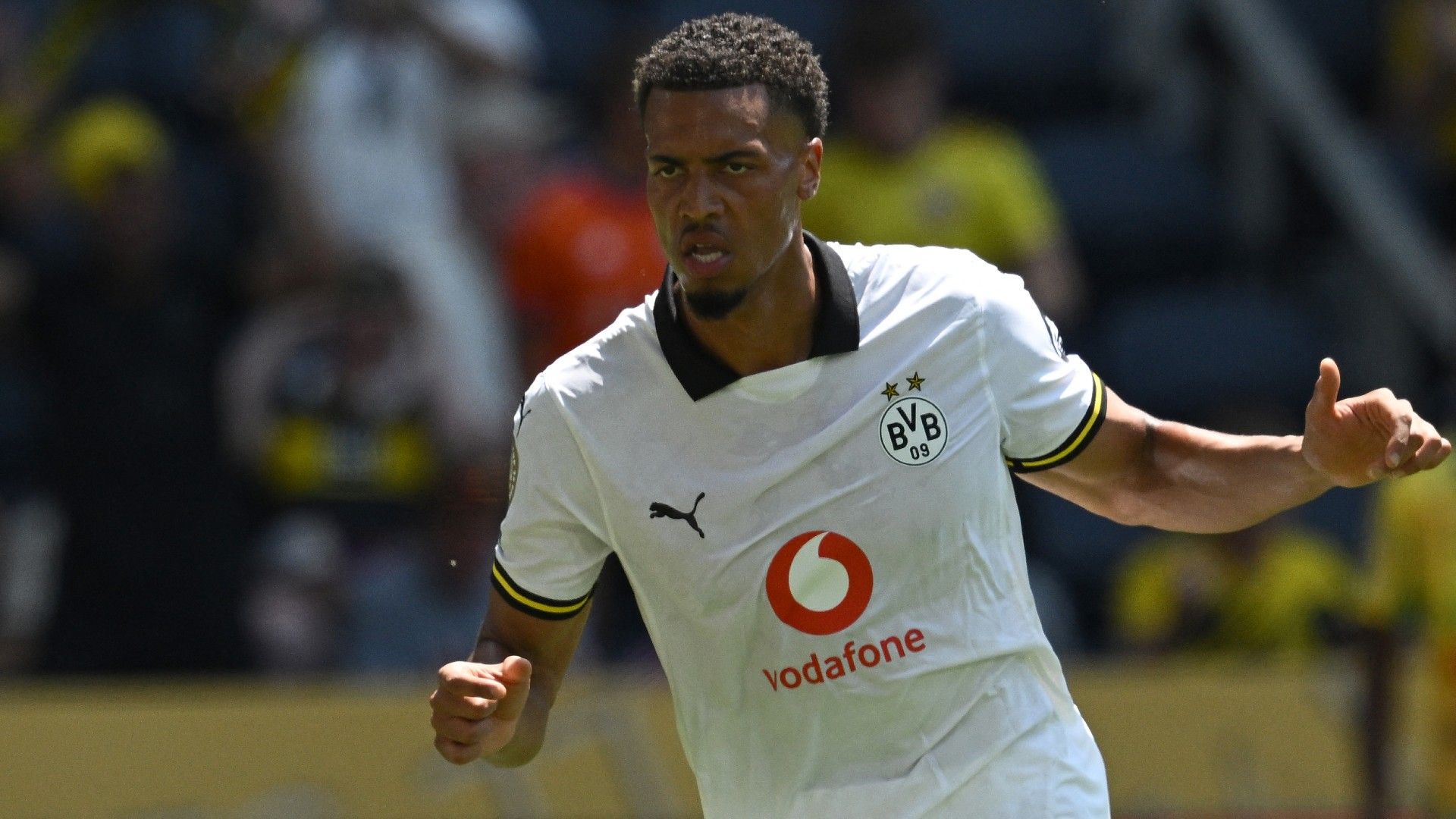  Borussia Dortmund's German midfielder #08 Felix Nmecha celebrates after scoring