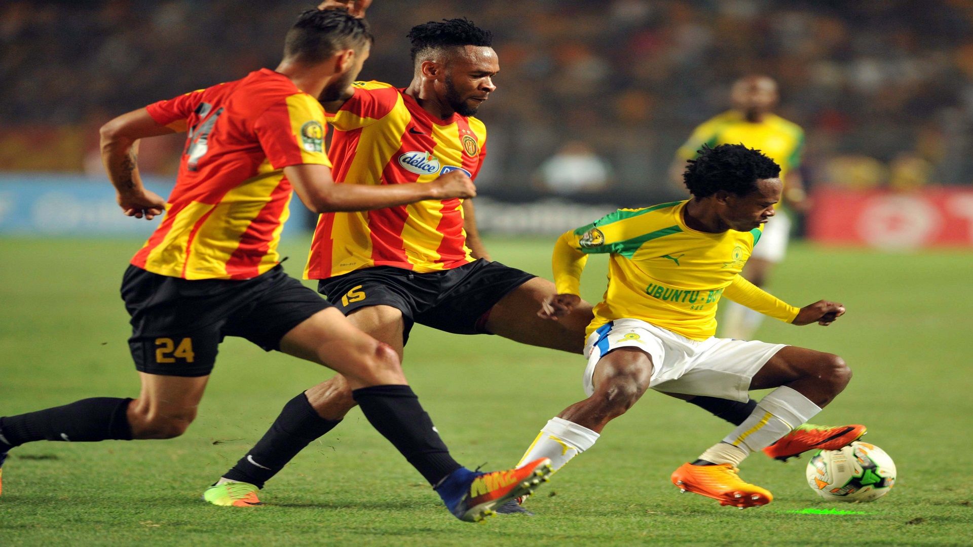 Percy Tau of Mamelodi Sundowns with Esperance’s Coulibaly Fousseny 2017 CAF Champions League