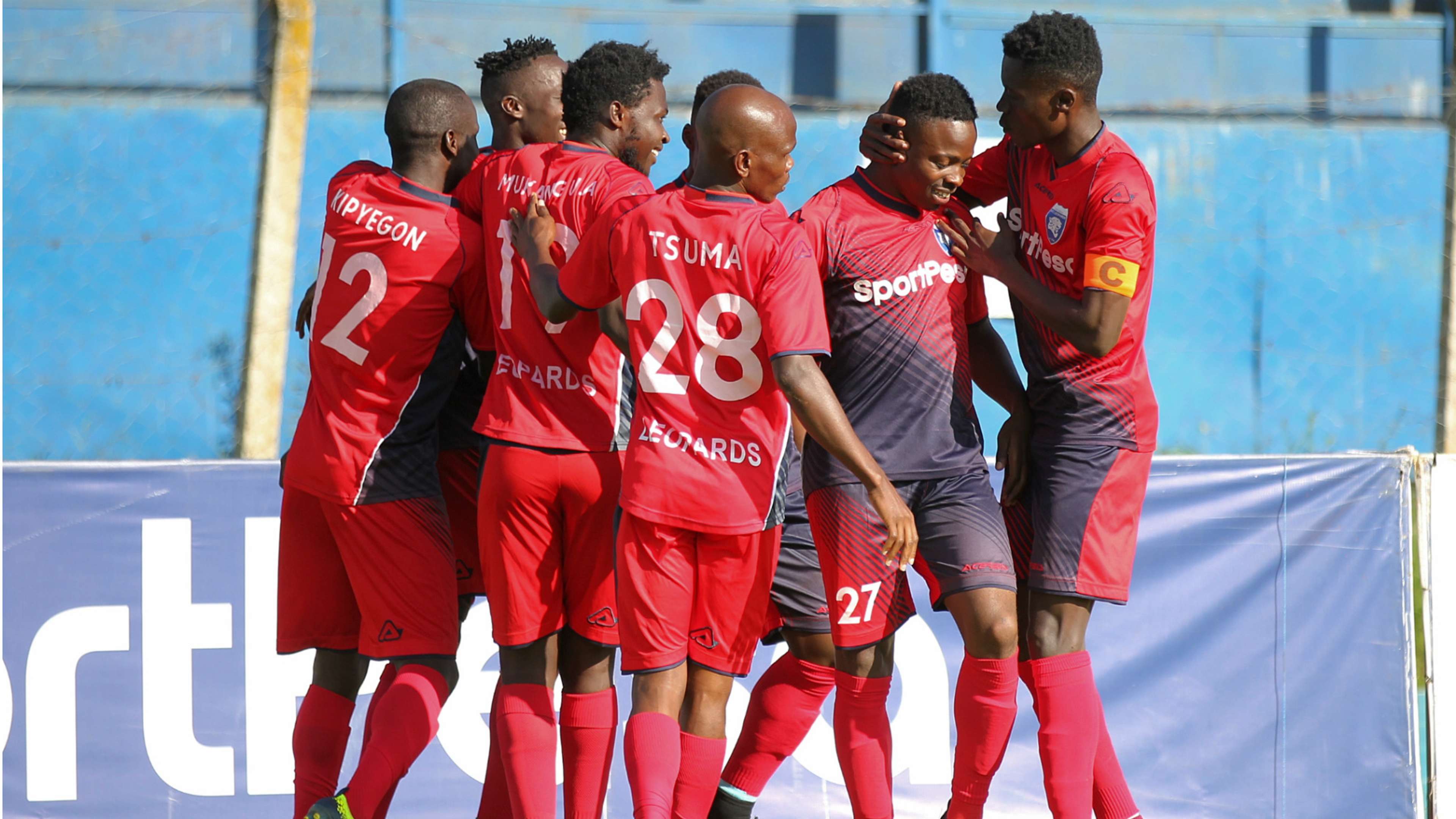 Isaac Kipyegon and AFC Leopards players celebrate.