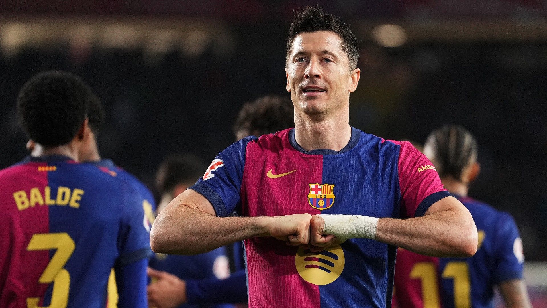 Robert Lewandowski of FC Barcelona celebrates scoring 