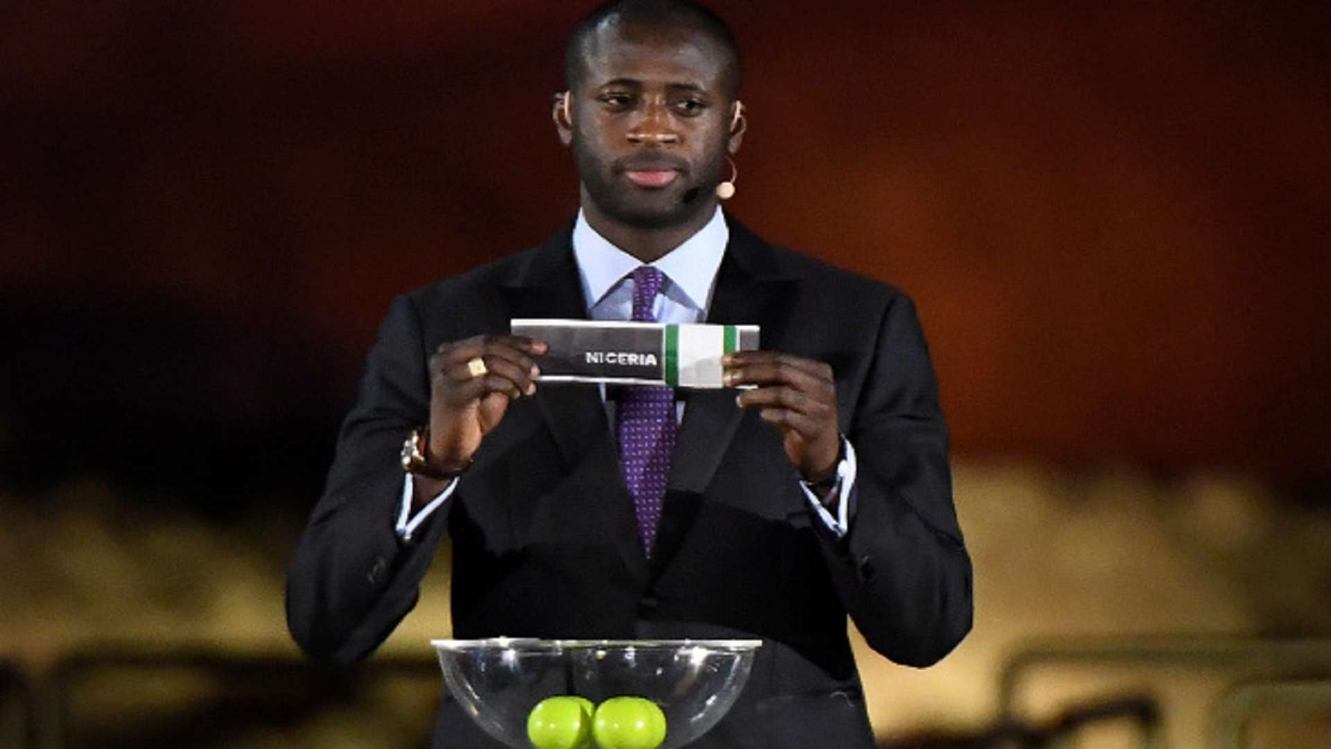 Former Ivorian midfielder Yaya Toure shows Nigeria ballot during the 2019 CAF African Cup of Nations (CAN) draw