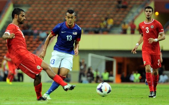 Malaysia vs Bahrain - 101513 - Fakri Saarani - Waleed Alhayam
