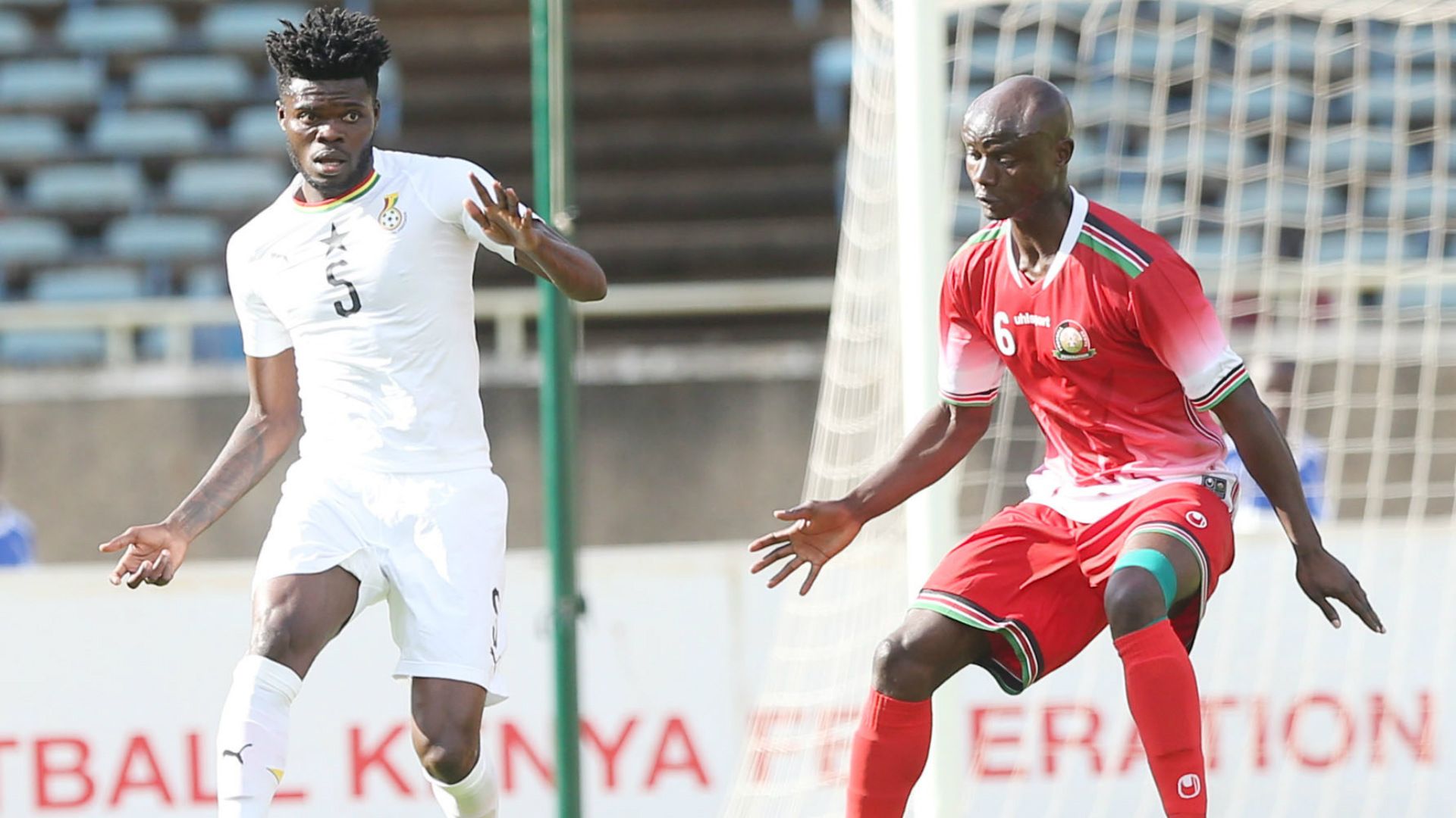 Dennis Odhiambo of Sofapaka and Kenya v Thomas Partey of Ghana.