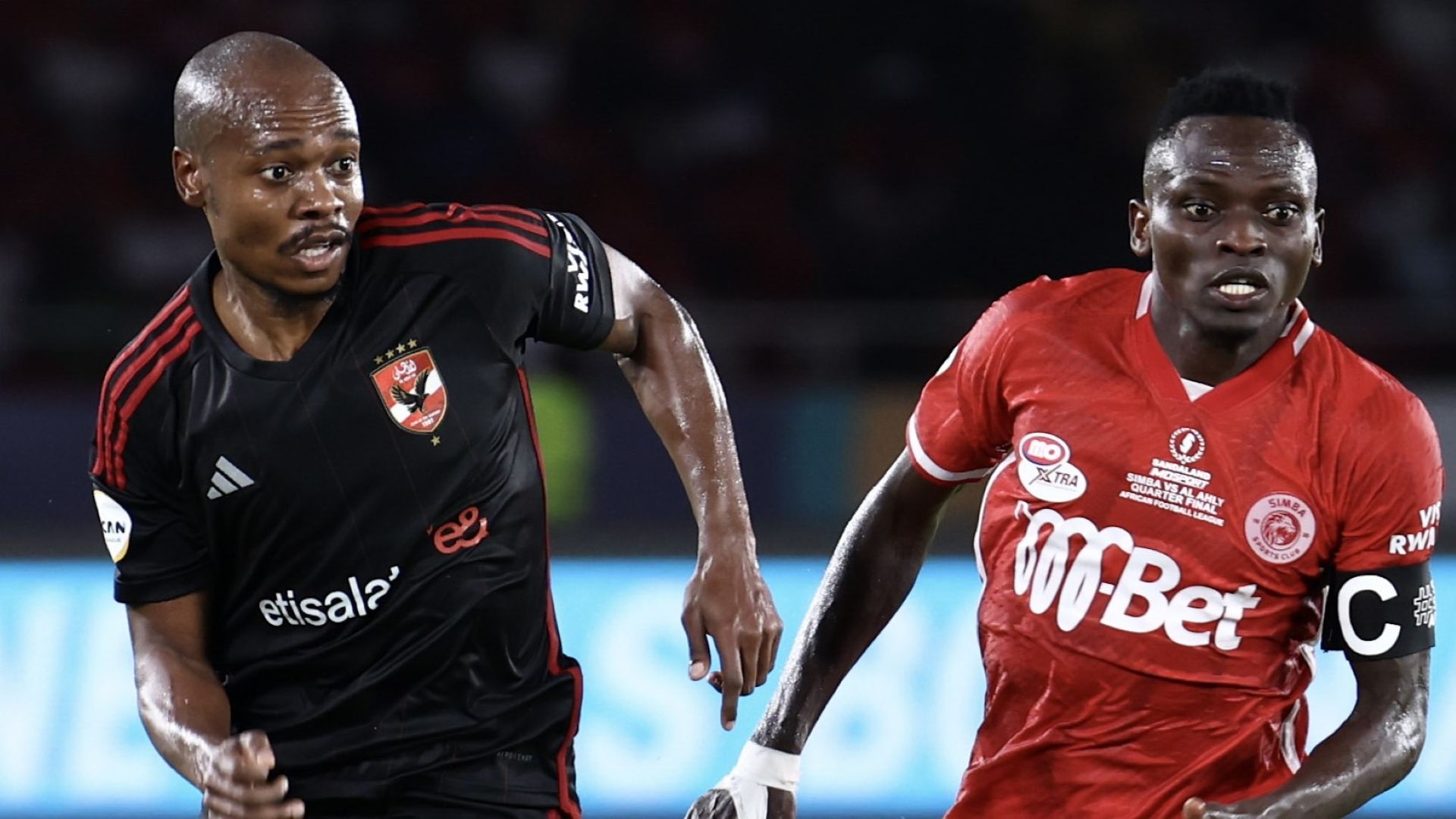 Percy Tau, Mohamed Hussein Mohamed