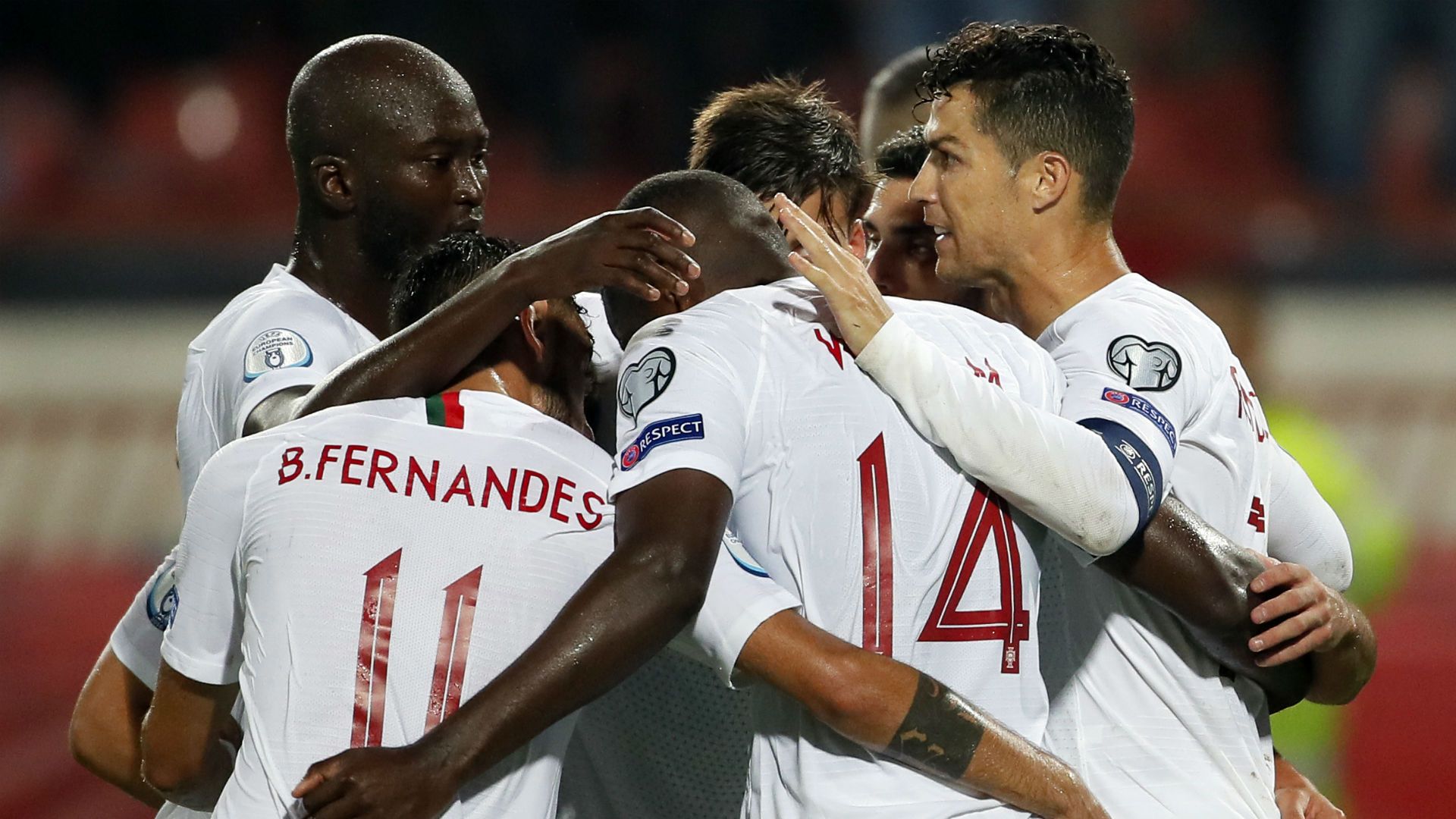 Portugal celebrates against Serbia
