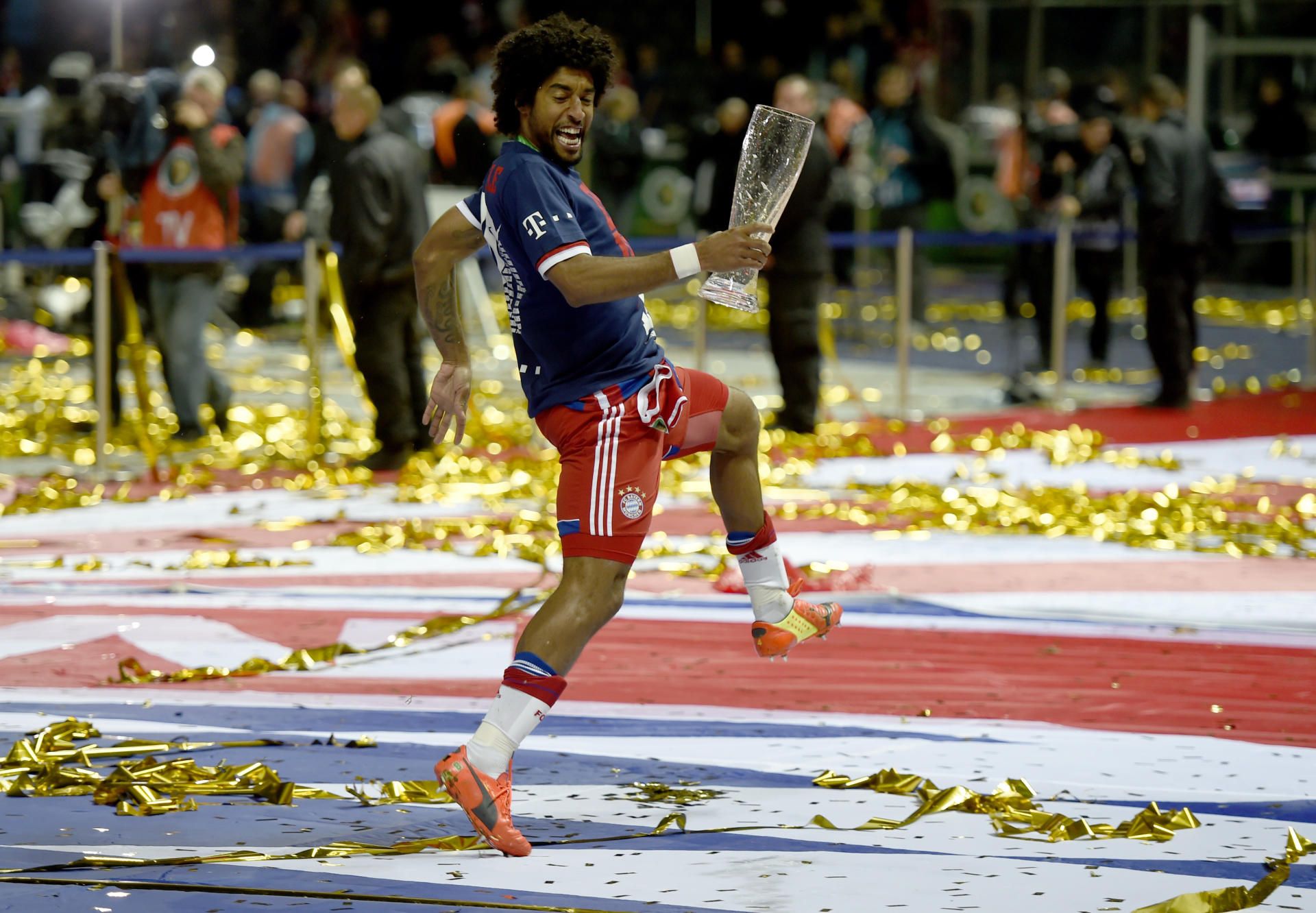 Bayern Munich's Dante celebrates after DFB-Cup win vs Borussia Dortmund