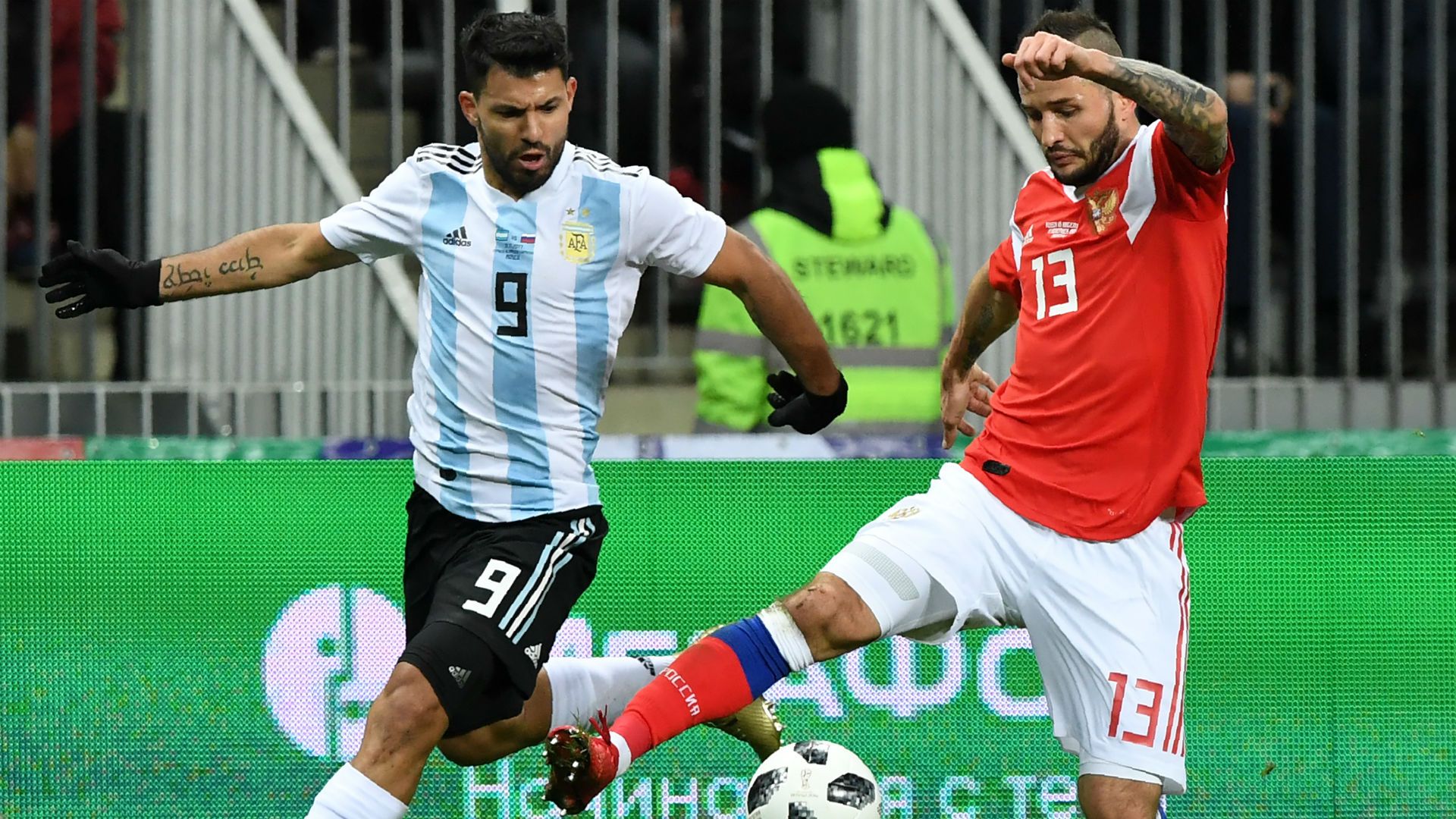 Sergio Aguero and Fyodor Kudryashov