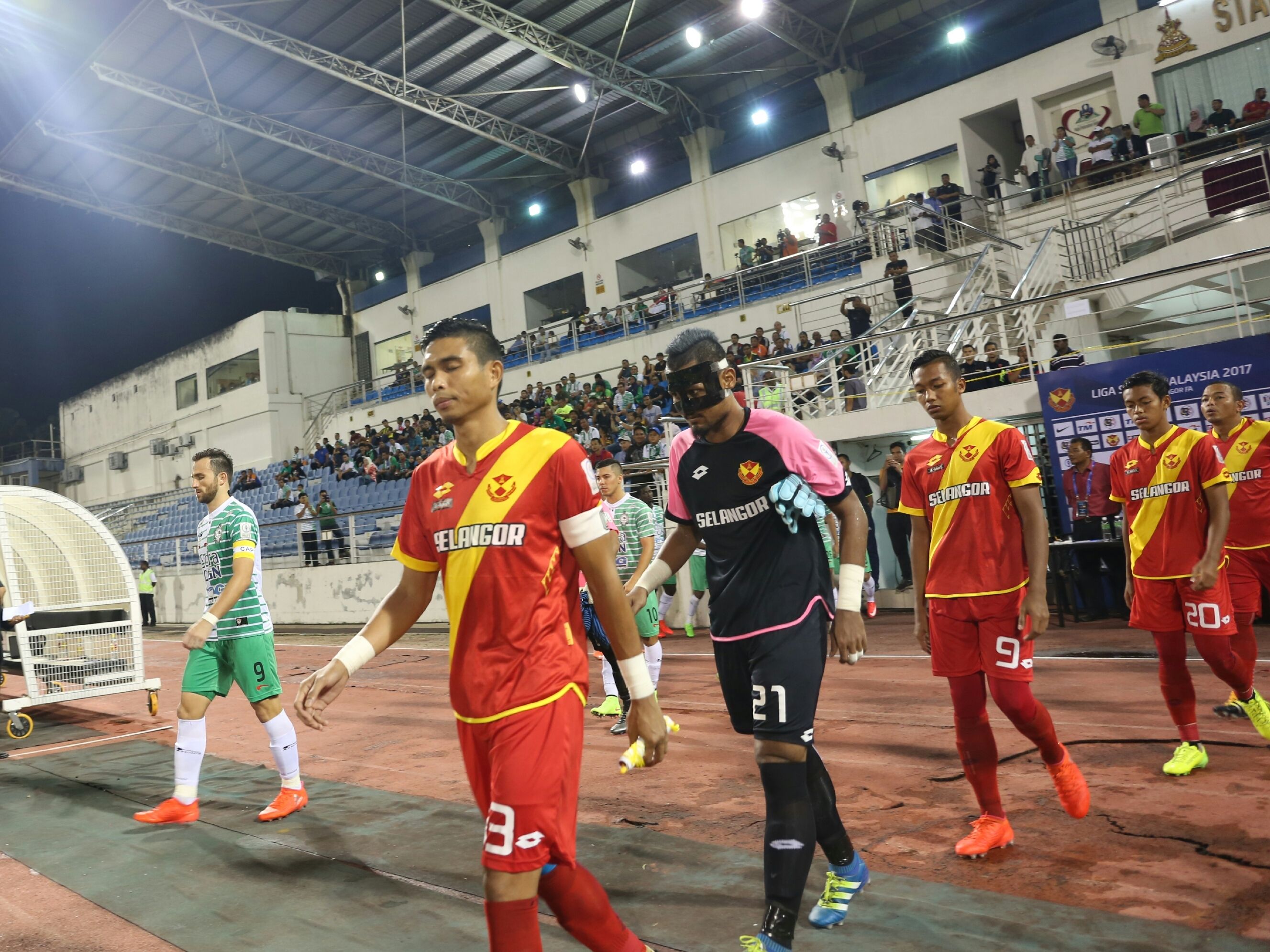 Selangor and Melaka United players walking out of the tunnel before their league match 27/1/2017