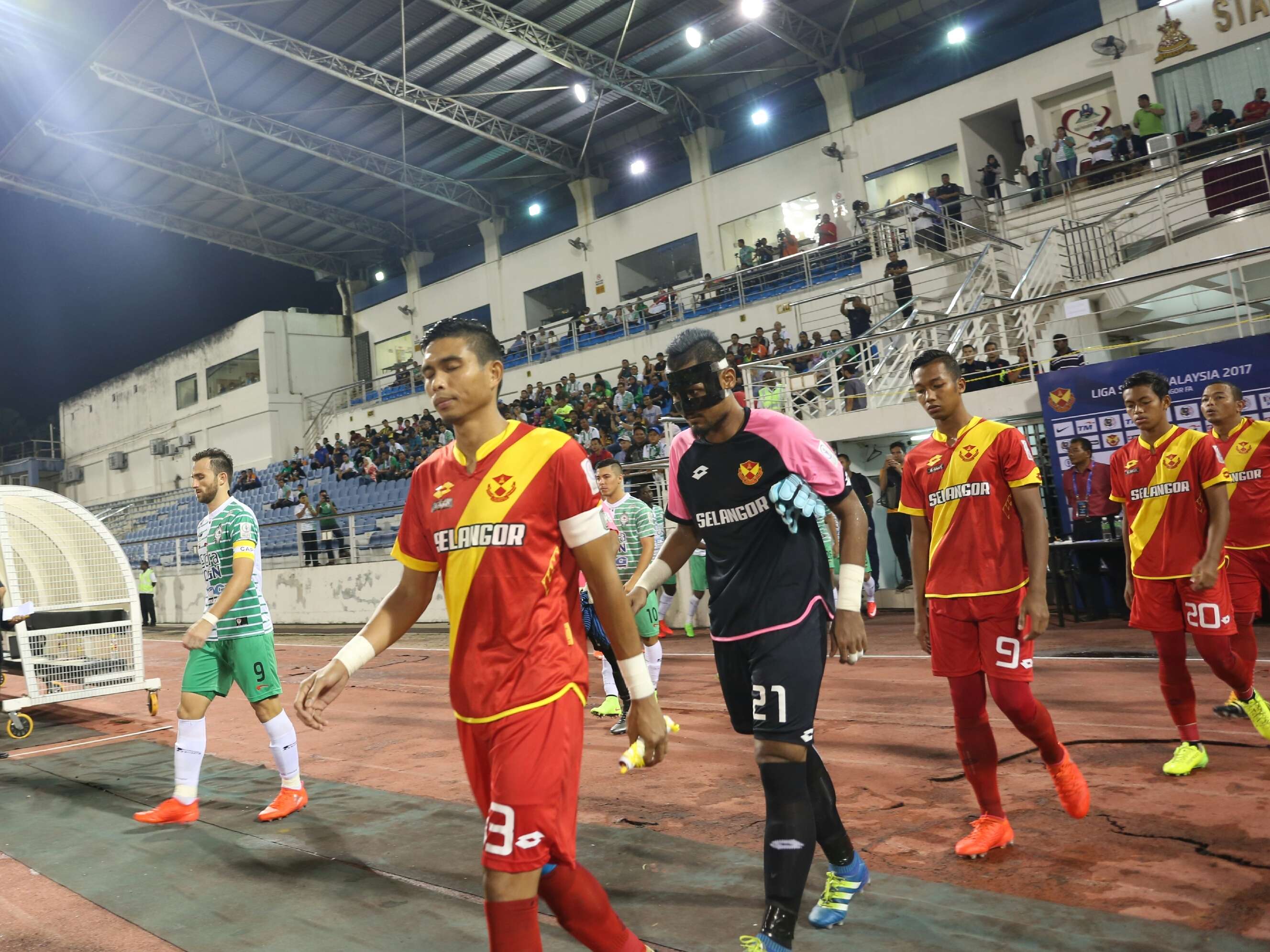 Selangor and Melaka United players walking out of the tunnel before their league match 27/1/2017