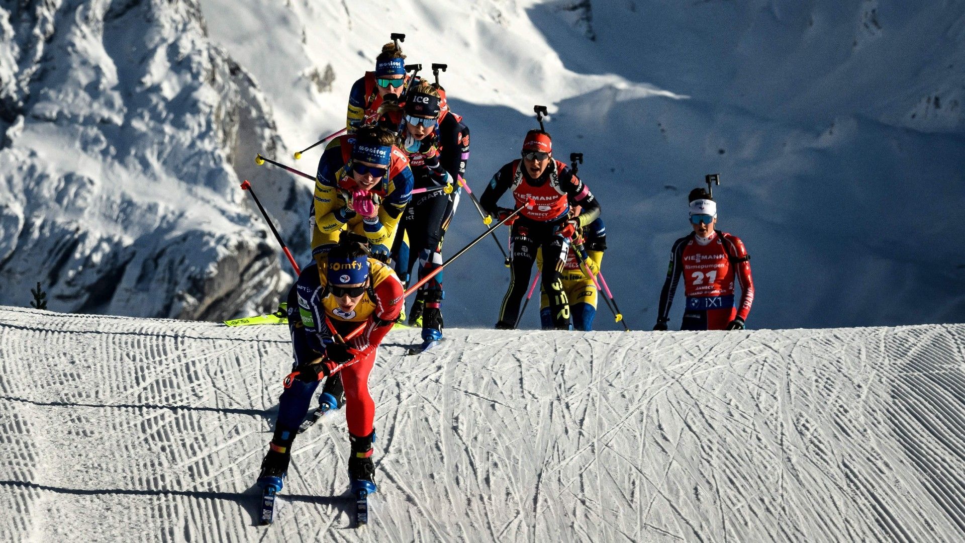 Biathletes, including French Julia Simon (C), compete in the womens 12,5km mass-start event