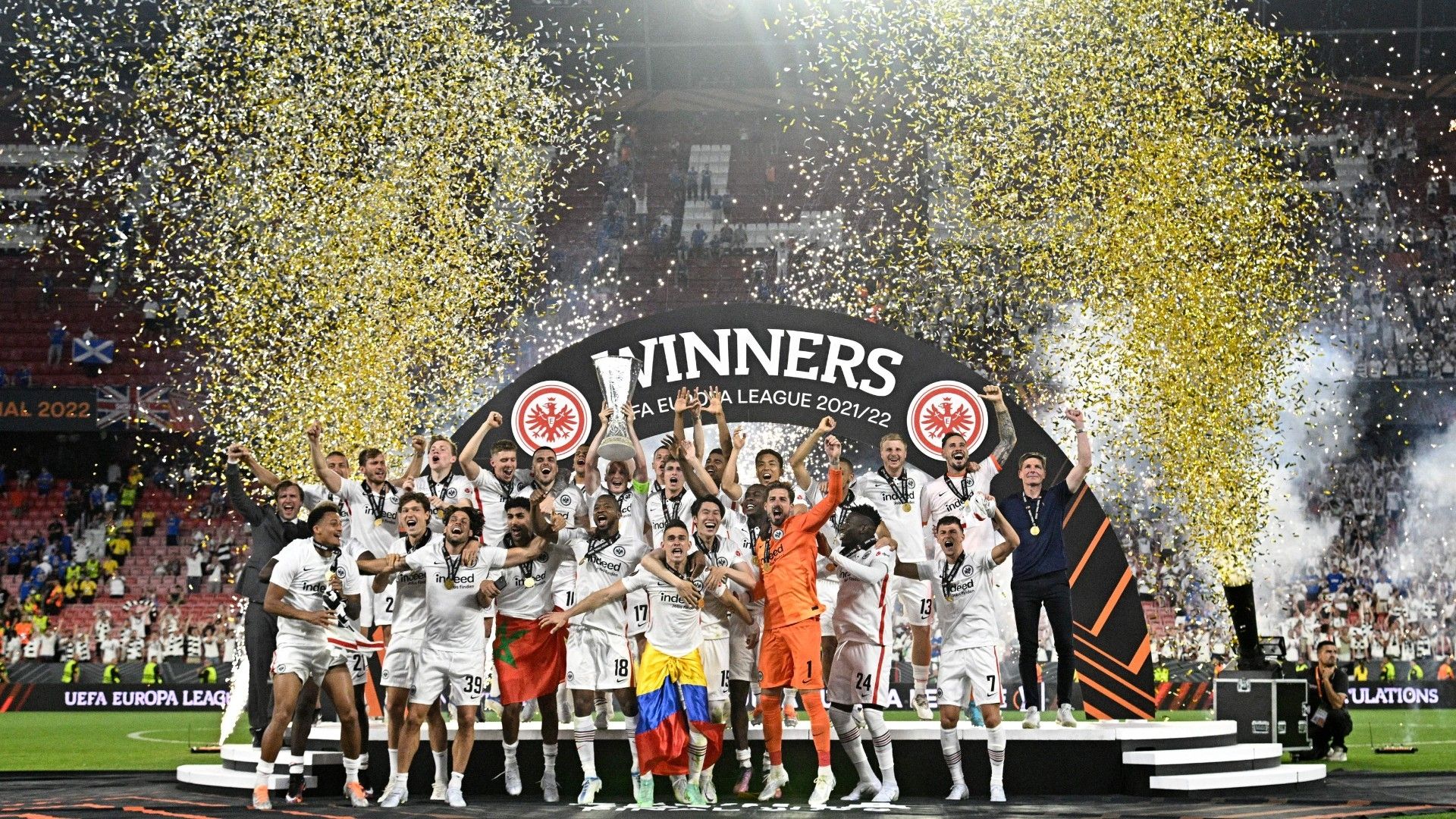 Eintracht Frankfurt's German midfielder and captain Sebastian Rode lifts the trophy as Eintracht Frankfurt player