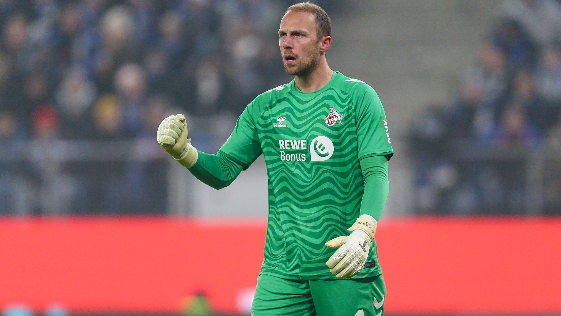 Goalkeeper Marvin Schwäbe of Köln reacts 